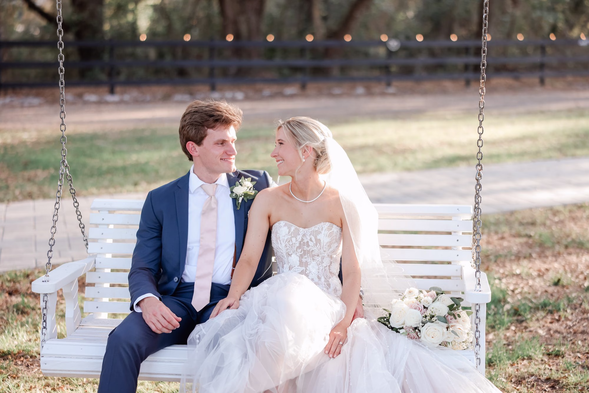 Bride and Groom Porch Swing Wedding Portrait | Tampa Hair and Makeup Adore Bridal | Clearwater Photographer Lifelong Photography Studio