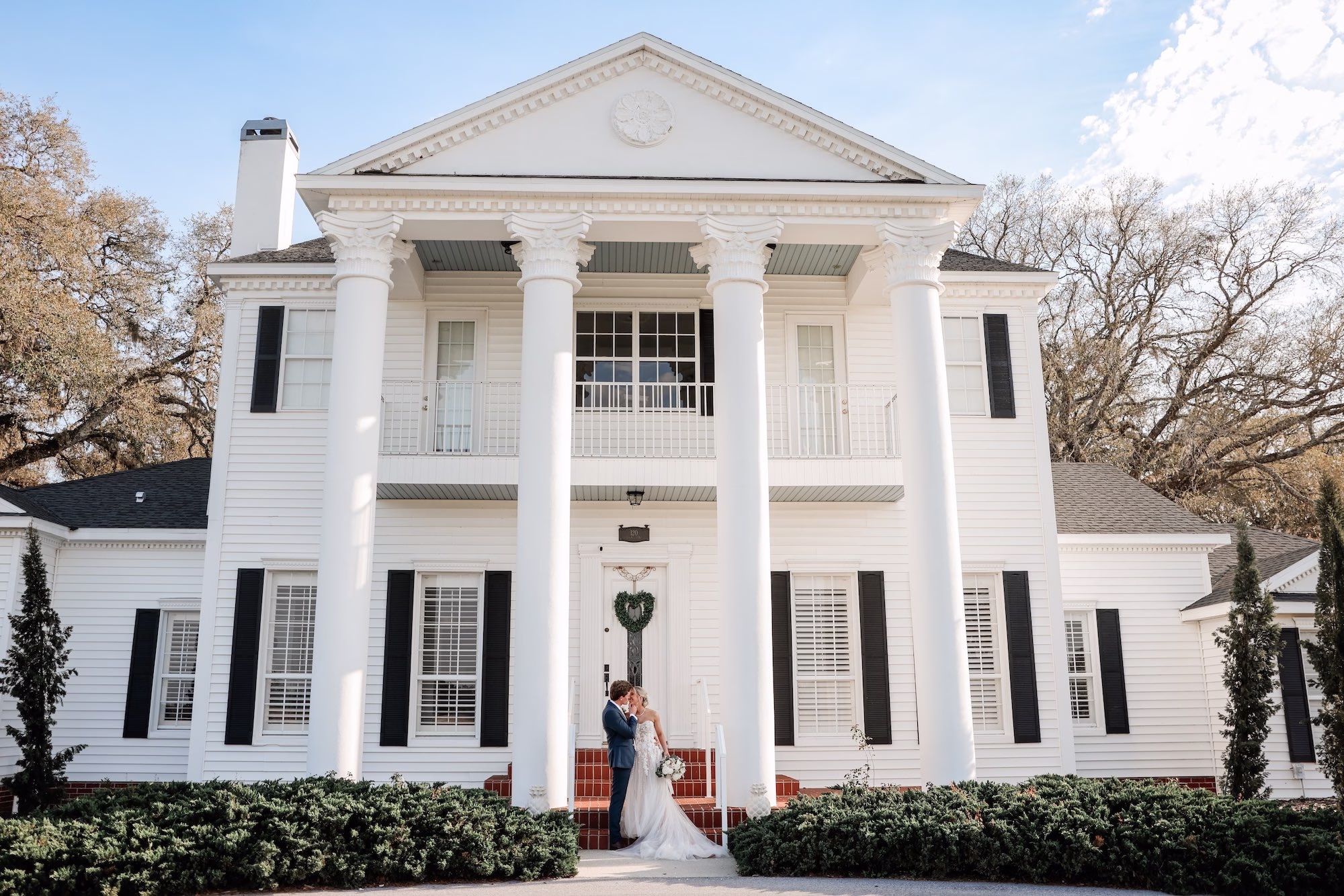 Bride and Groom Kissing Wedding Portrait | Clearwater Photographer Lifelong Photography Studio | Tampa Bay Event Venue Legacy Lane Weddings