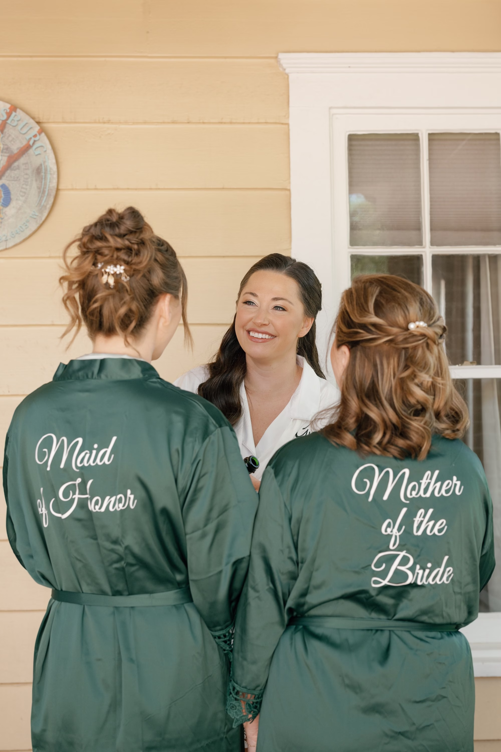 2Tropical Green Florida Wedding Ideas - Tropical, Green Downtown St. Pete Wedding | Poynter Institute Bride and Bridesmaid and Mother of the Bride Getting Ready Wedding Portrait in Green Robes | Slicked Back Curled Half Up Half Down Wedding Bridal Hair Inspiration | Natural Wedding Bridal Makeup Ideas | Florida Hair and Makeup Adore Bridal | Tampa Bay Photographer Dewitt For Love