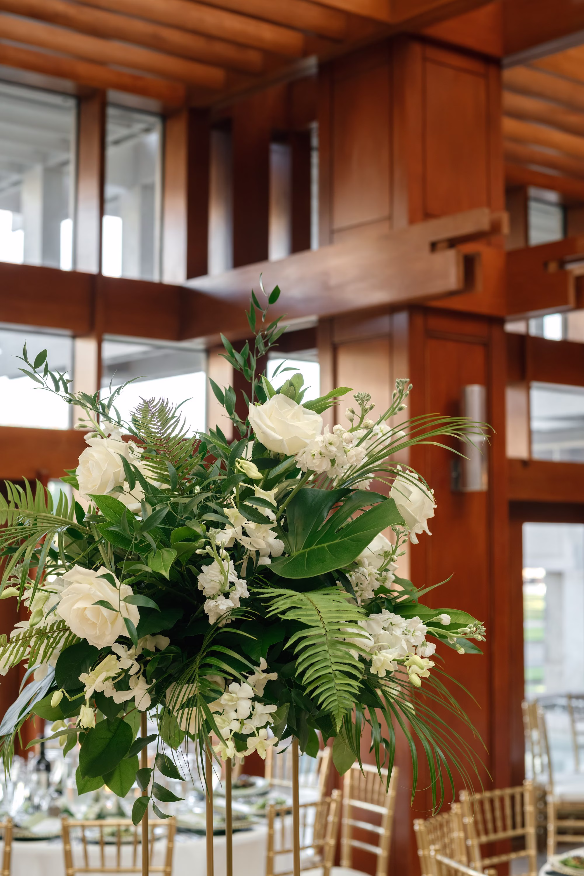 37Tropical Green Florida Wedding Ideas - Tropical, Green Downtown St. Pete Wedding | Poynter Institute Tropical Green and White Luxurious Ballroom Wedding Reception | Tall Gold Platform Centerpieces with White Florals and Greenery Arrangement Ideas