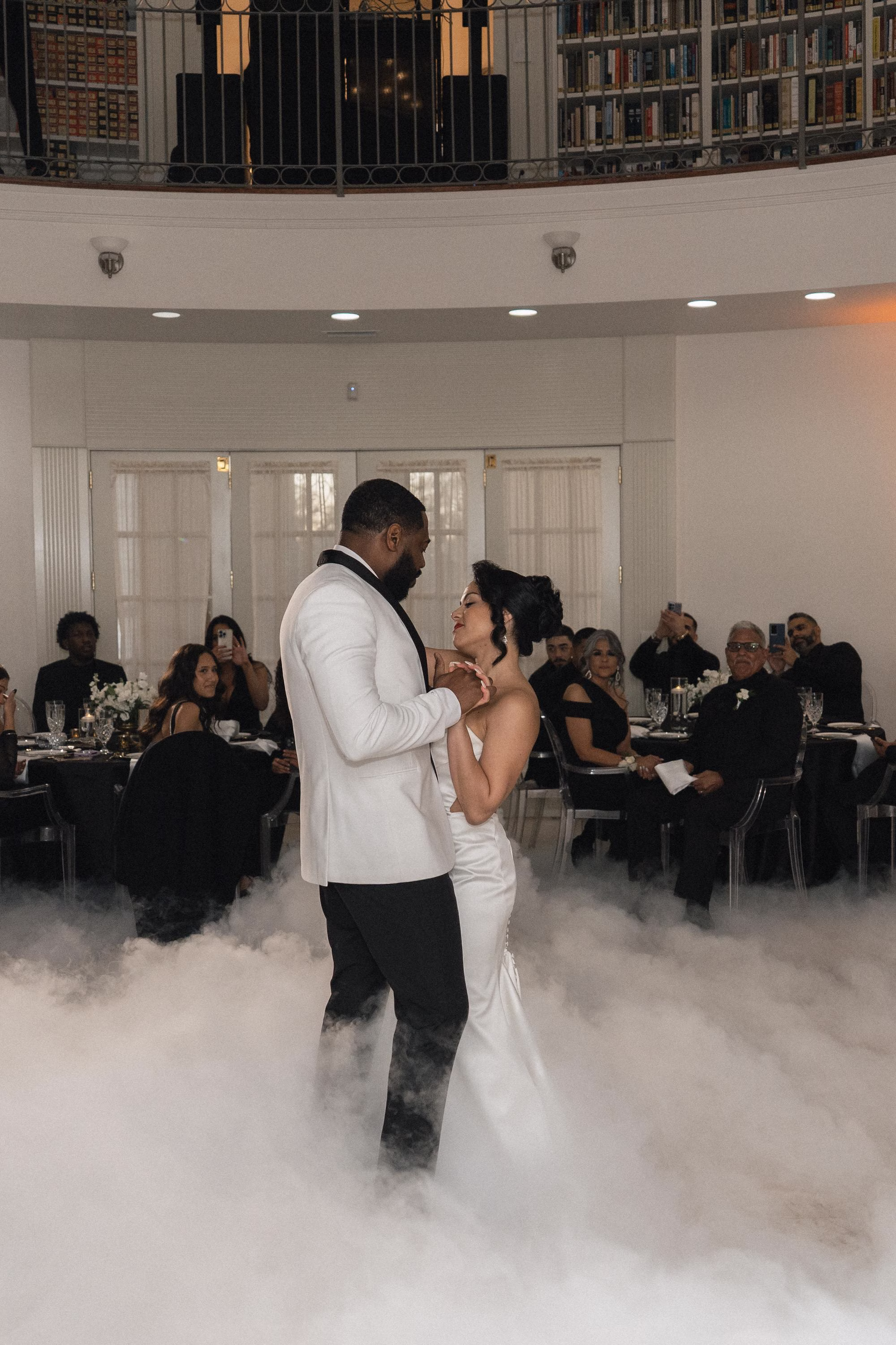 44Timeless Black and Wedding New Years Eve Wedding Ideas - Timeless Black and White Tarpon Springs Wedding | Whitehurst Gallery Bride and Groom First Dance Wedding Portrait | Indoor Smoke Dance Floor Inspiration | Tampa Bay DJ Graingertainment | Tampa Bay Photographer Amber Yonker Photography