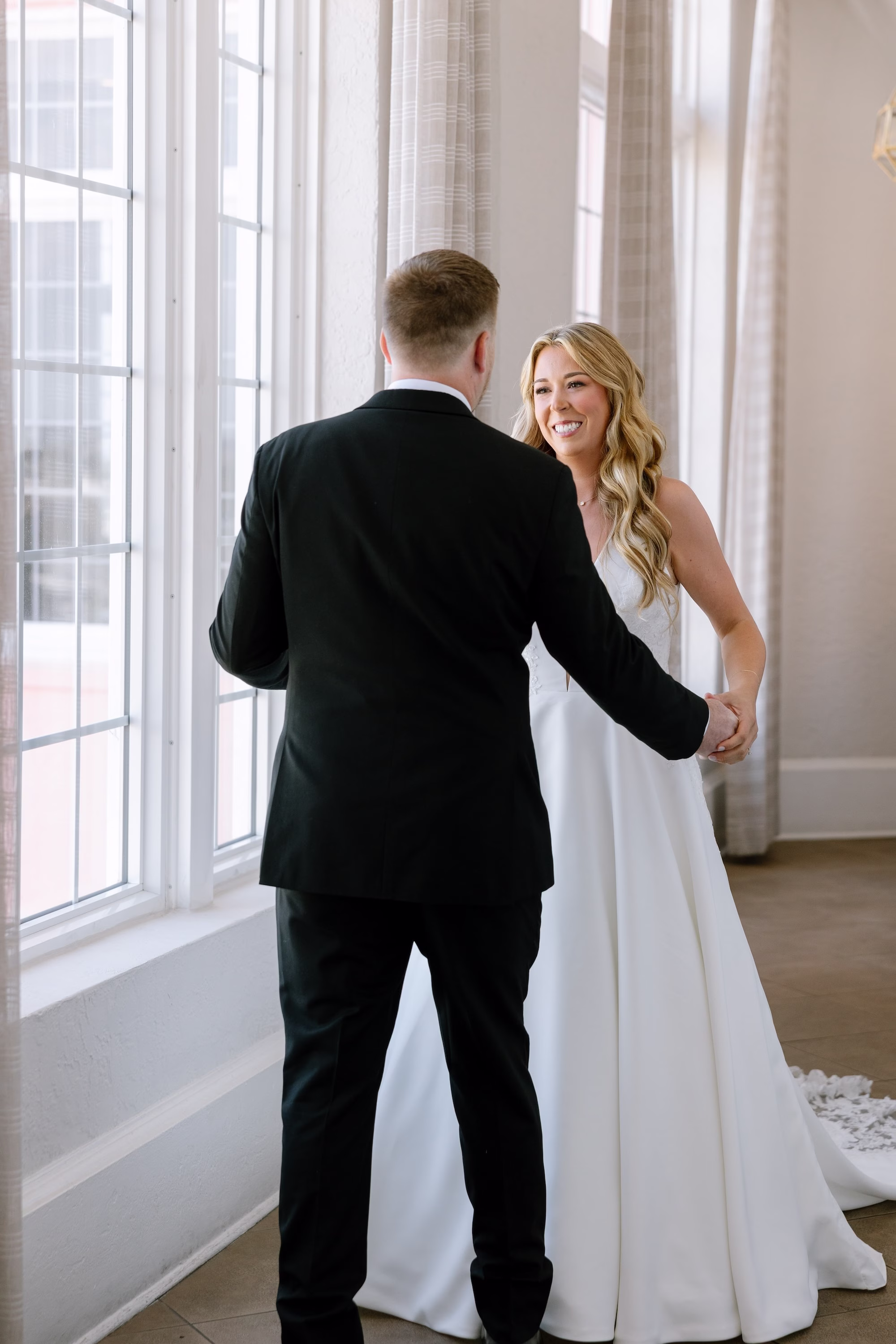 7Lux Romantic Blush Ivory and Blue Florida Wedding Inspiration - Romantic Pastel St. Pete Beach Wedding | The Don CeSar Bride and Groom First Look Wedding Portrait