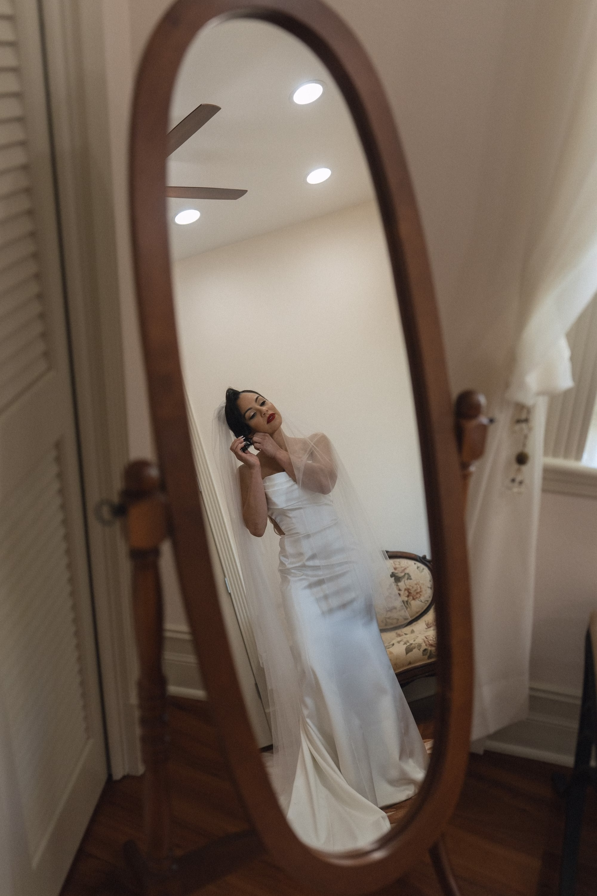 8Timeless Black and Wedding New Years Eve Wedding Ideas - Timeless Black and White Tarpon Springs Wedding | Whitehurst Gallery Bride Getting Ready in Mirror Wedding Portrait | Tampa Bay Photographer Amber Yonker Photography