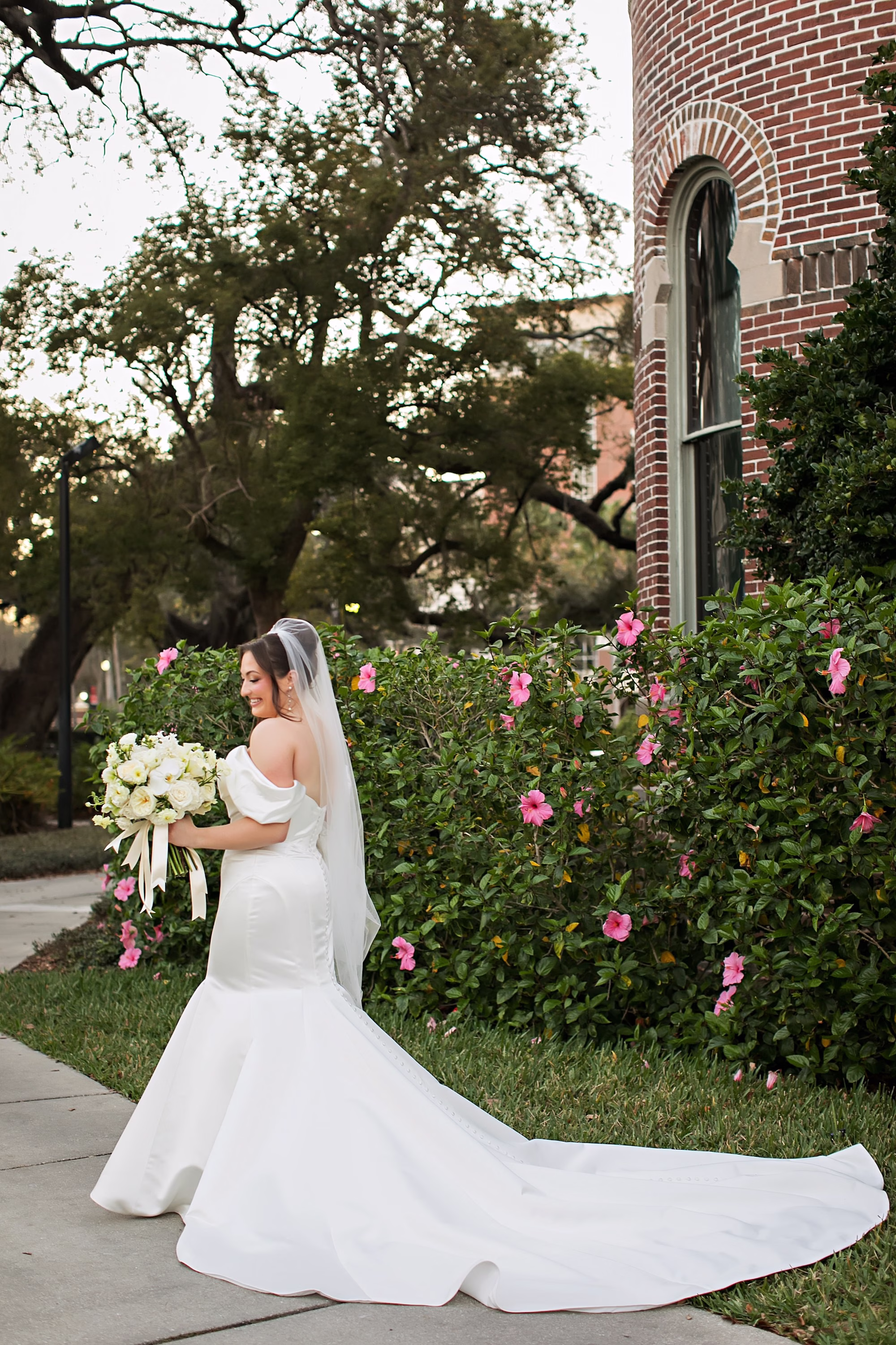 Bride Outdoor Wedding Portrait | White Off the Shoulder Fitted Wedding Gown with Long Train Inspiration | White Monochromatic Roses Bridal Bouquet Ideas | Tampa Bay Photographer Limelight Photography