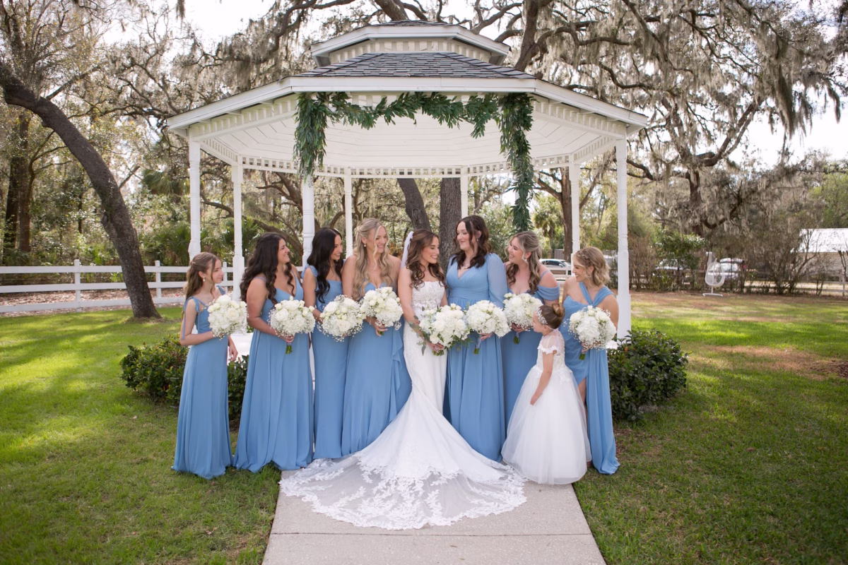 13Elegant Dusty Blue Rustic Wedding Ideas - Ivory and Dusty Blue Rustic Wedding | Lithia Acres Barn Bride and Bridesmaids Wedding Portrait | Mismatched Dusty Blue Bridesmaid Dress Inspiration