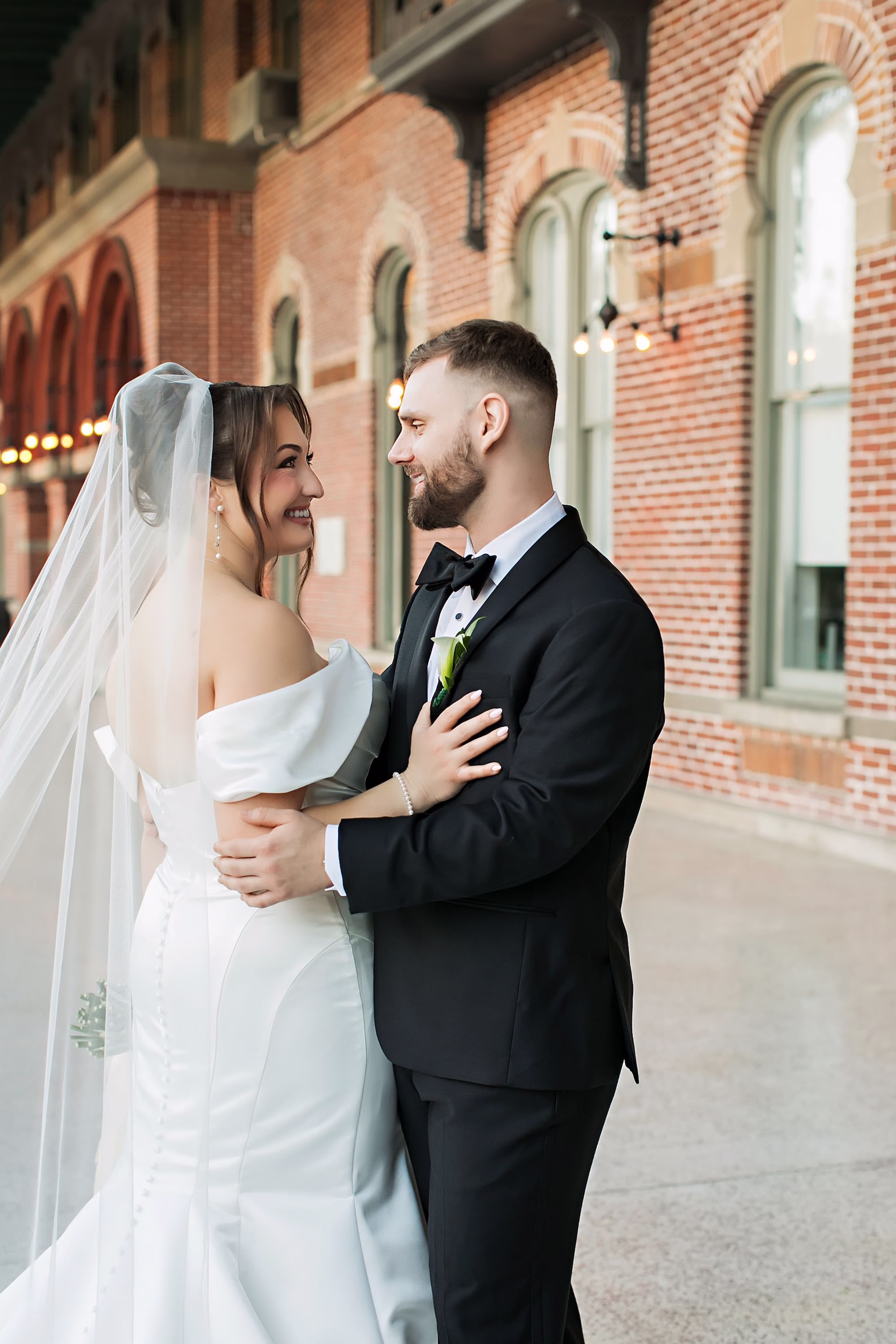 Bride and Groom Wedding Portrait | Classic Black and White Groom Tuxedo Ideas | White Fit and Flare White Closet Bridal Company Wedding Gown Inspiration | Tampa Bay Photographer Limelight Photography
