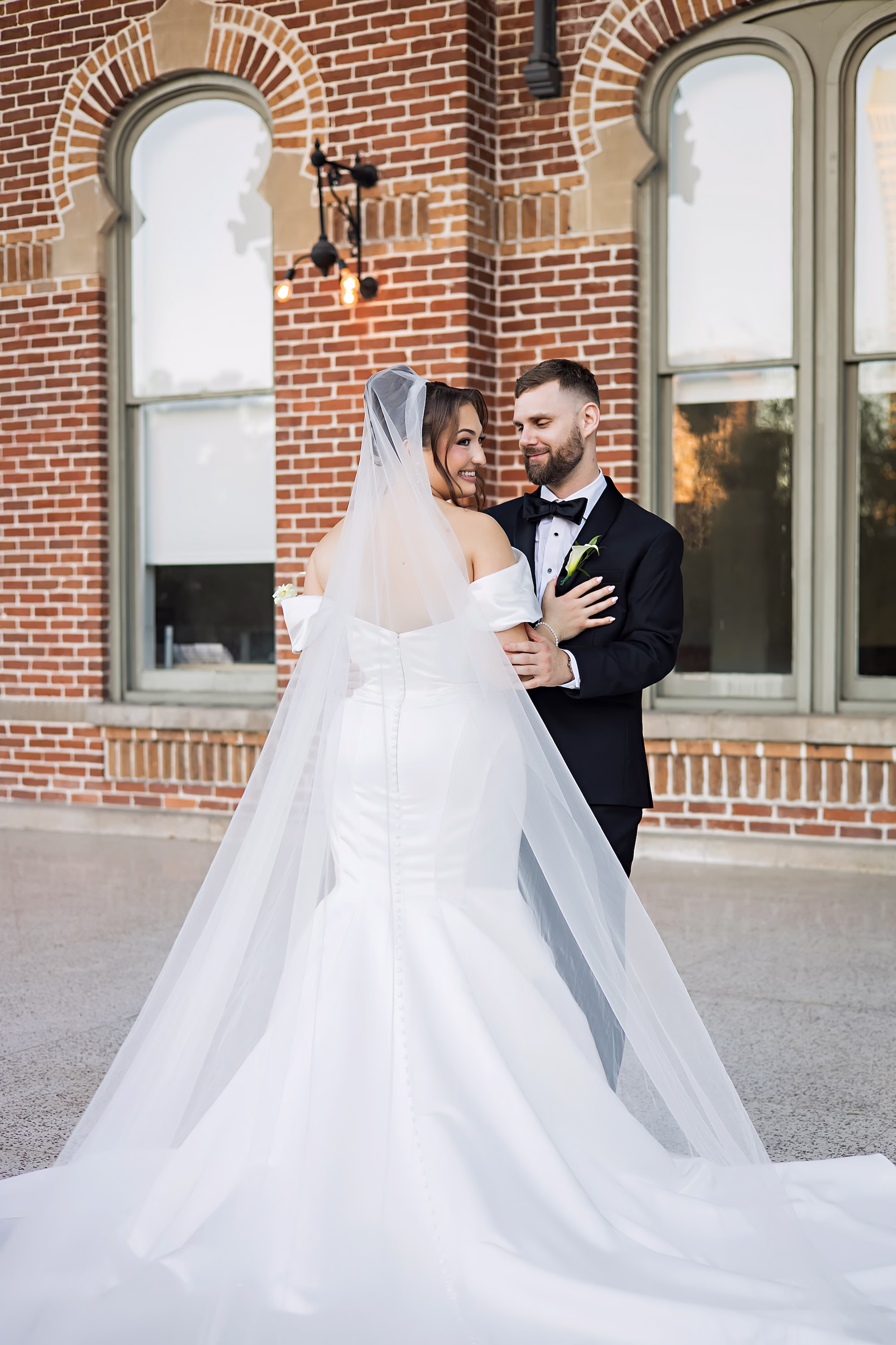 Bride and Groom Wedding Portrait | Classic Black and White Groom Tuxedo Ideas | White Fit and Flare White Closet Bridal Company Wedding Gown Inspiration | Tampa Bay Photographer Limelight Photography