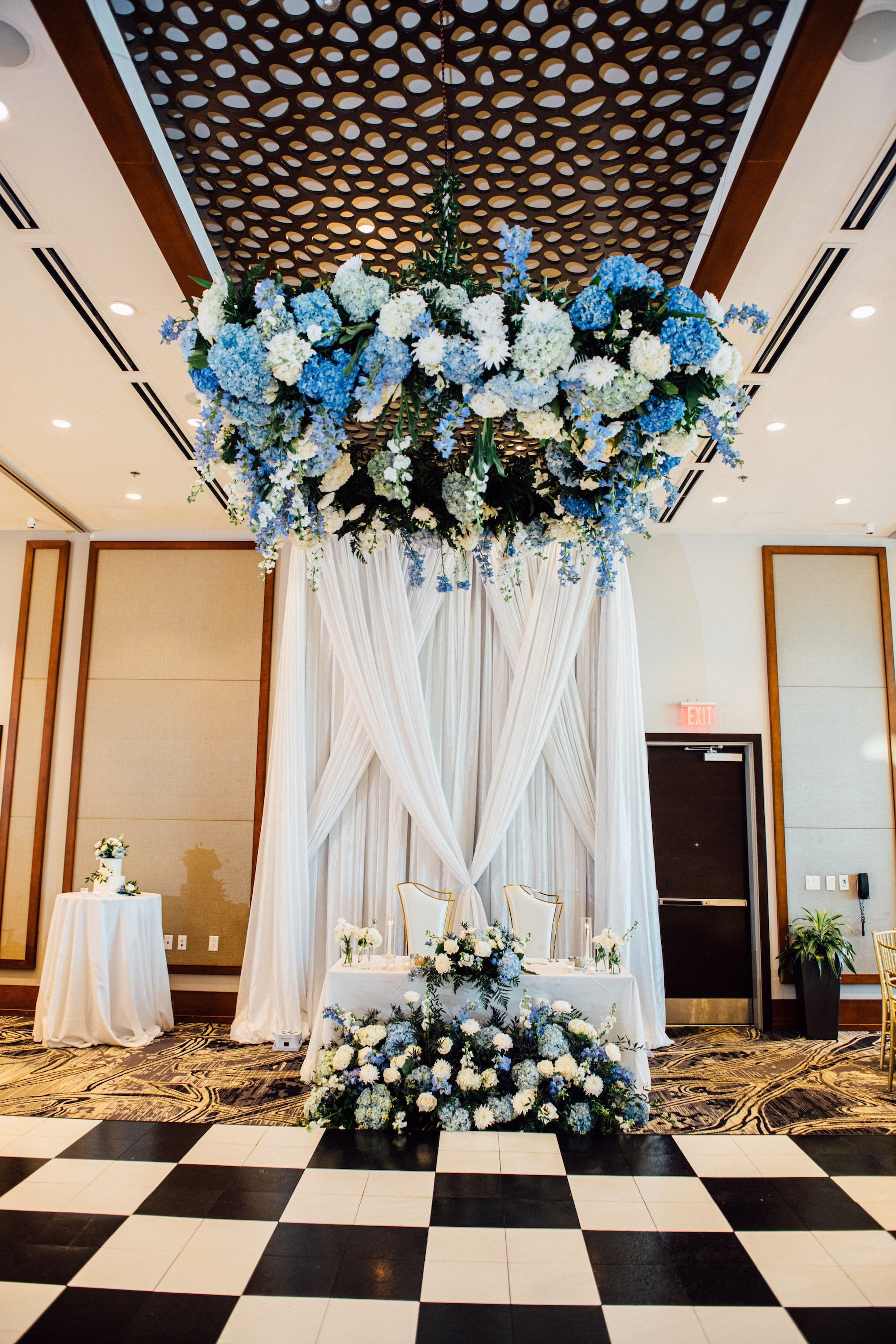 27Elegant Blue Coastal Waterfront Florida Wedding Ideas The CURRENT - Elegant Blue and White Tampa Wedding | The CURRENT Elegant Blue Coastal Waterfront Florida Wedding Reception Sweetheart Table Decor Inspiration | Tampa Bay Event Venue The Current