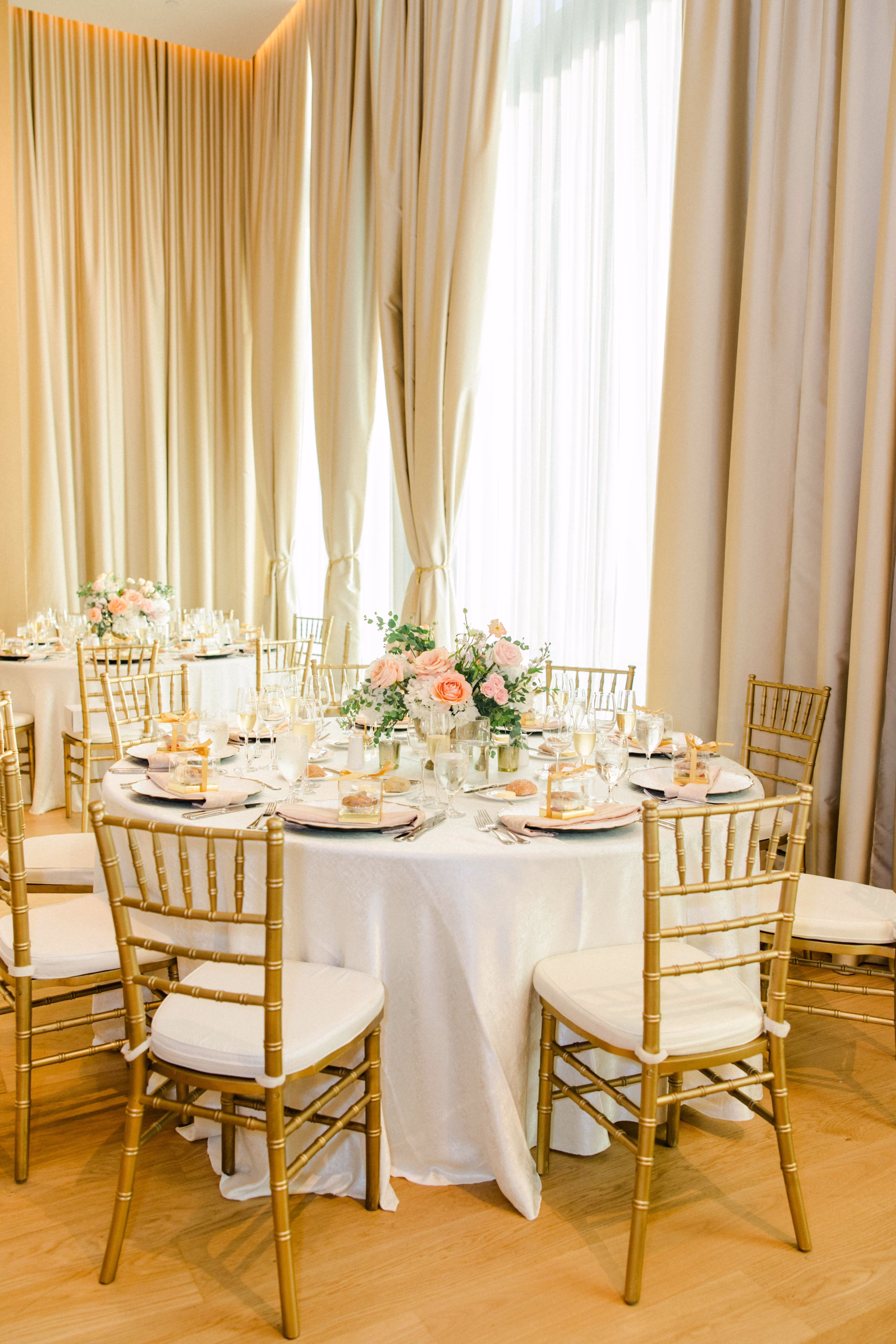 Luxurious Ballroom Wedding Reception | Modern Gold Chiavari Chairs | Spring Pastel Centerpieces with Blush Pink, White Hydrangeas and Roses Flower Arrangement Centerpiece Ideas | Downtown Event Venue The Edition Hotel Tampa