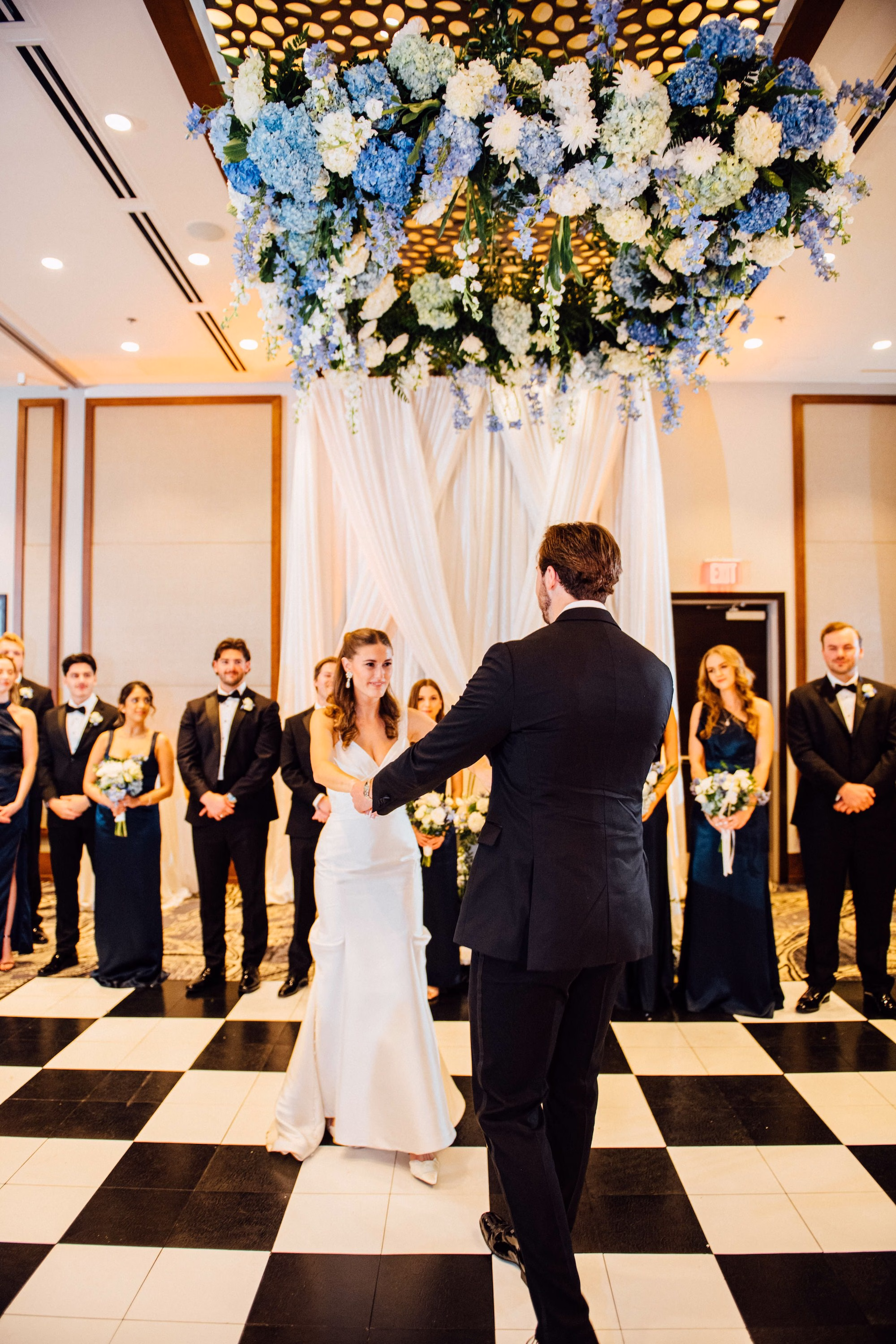 33Elegant Blue Coastal Waterfront Florida Wedding Ideas The CURRENT - Elegant Blue and White Tampa Wedding | The CURRENT Bride and Groom First Dance Wedding Portrait | Tampa Bay Event Venue The Current