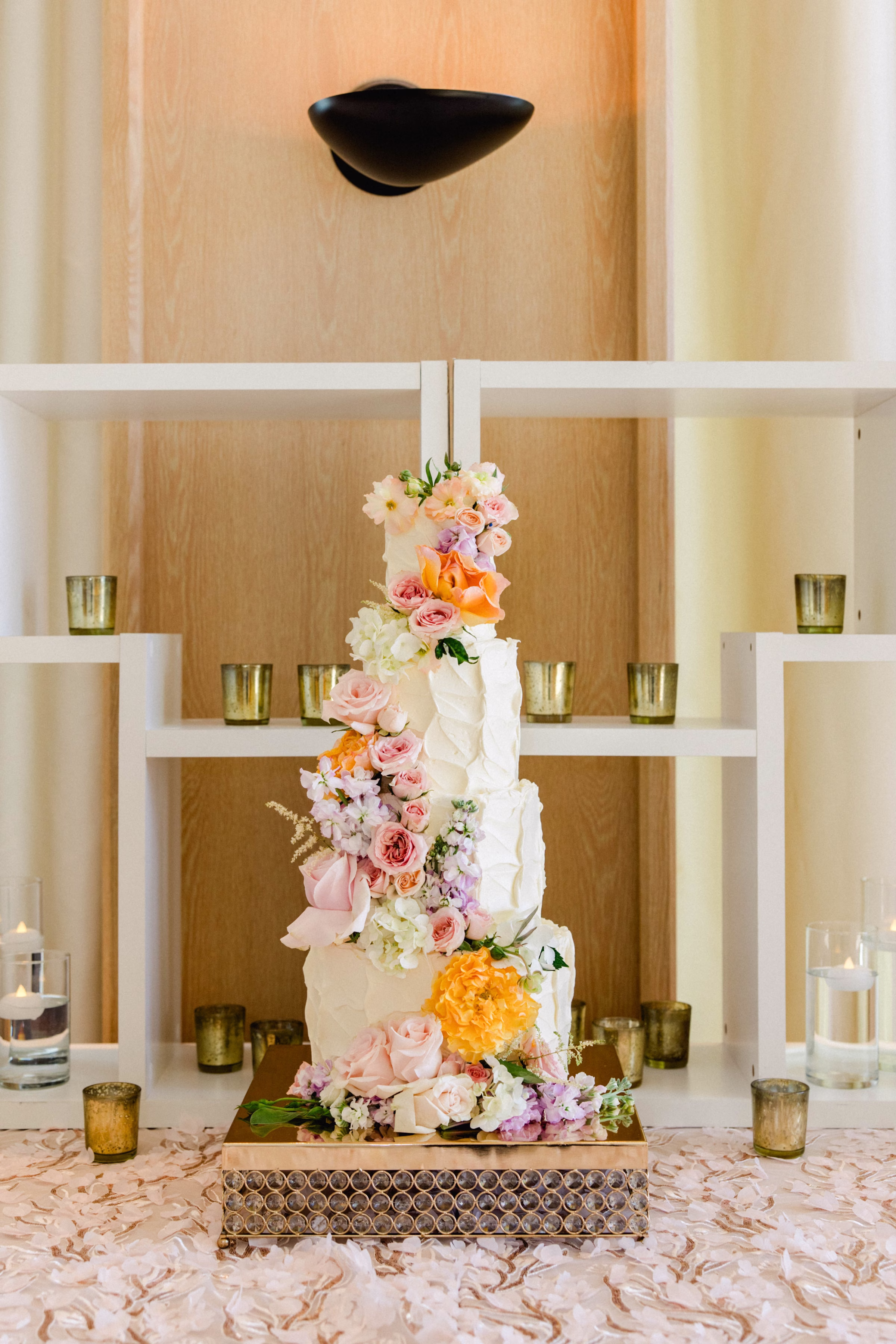 Four Tier White Wedding Cake with Spring Pastel Peach, Lavender, Blush, Yellow Floral Decor Inspiration