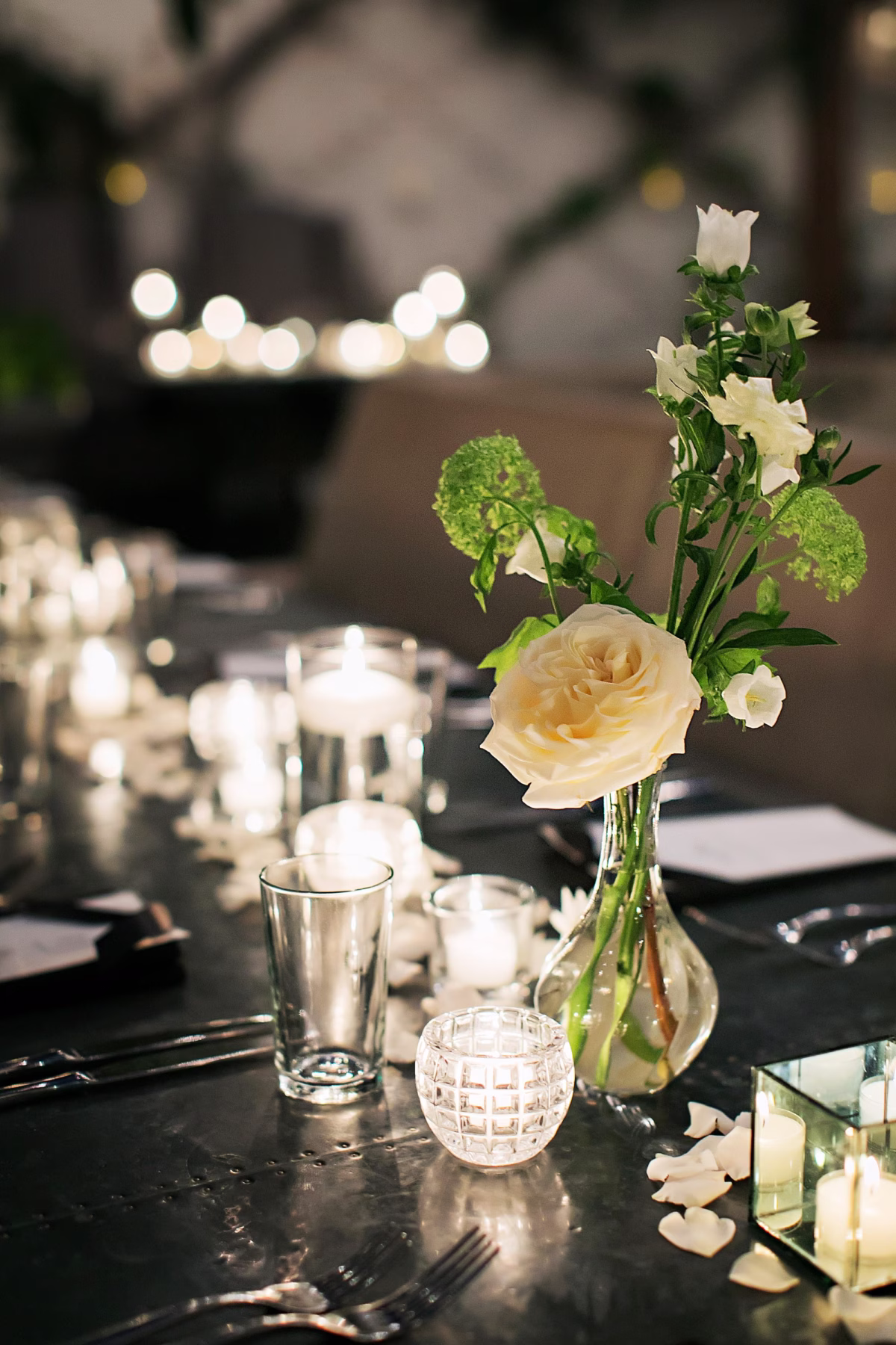 Classic Romantic Black and White Conservatory Wedding Reception Inspiration | Romantic Floating Candles and Monochromatic White Rose Centerpiece Decor Ideas | Tampa Event Venue Oxford Exchange
