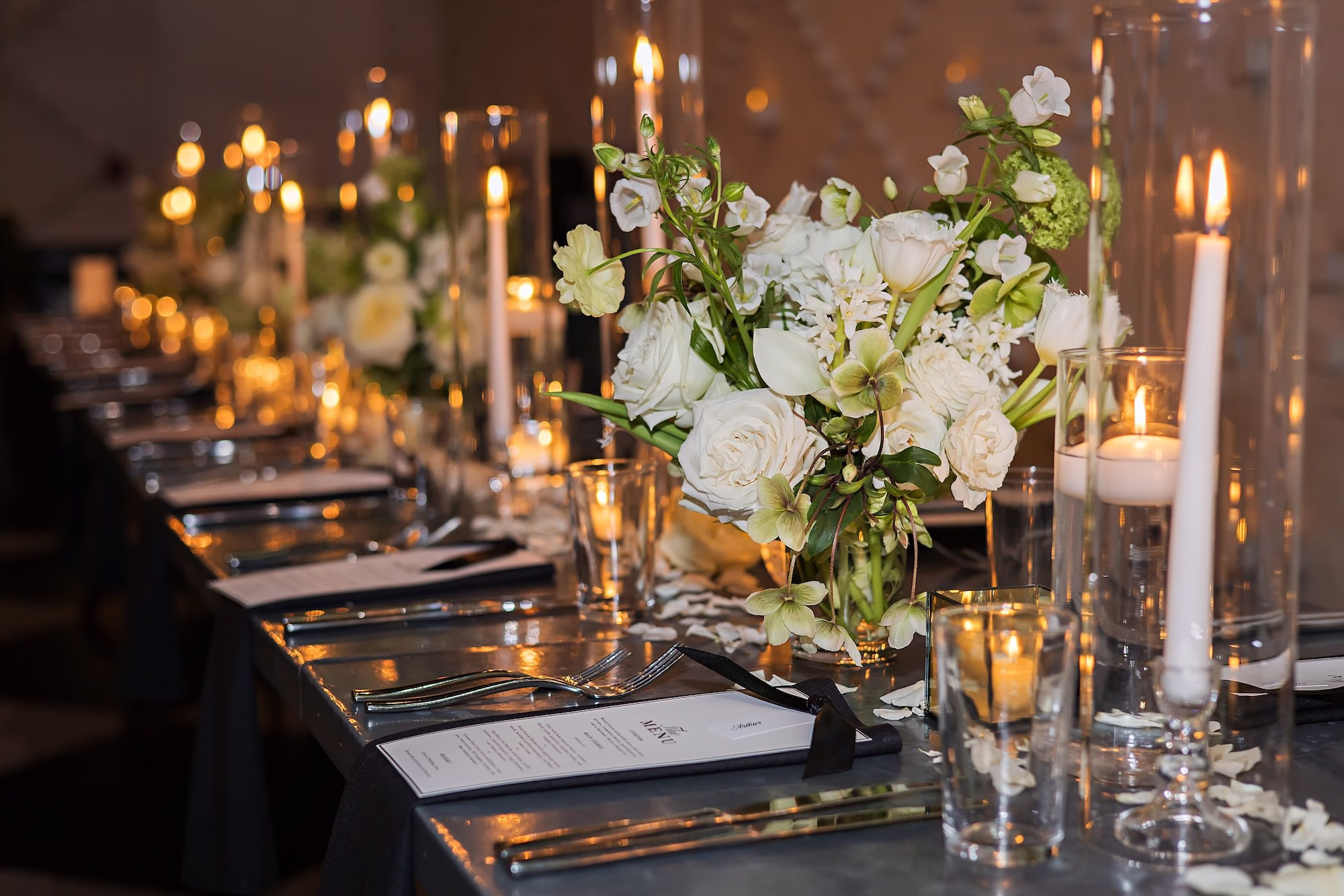 Classic Romantic Black and White Conservatory Wedding Reception Inspiration | Romantic Taper Candles in Glass Vases and White Roses with Greenery Centerpiece Decor Ideas | Tampa Event Venue Oxford Exchange