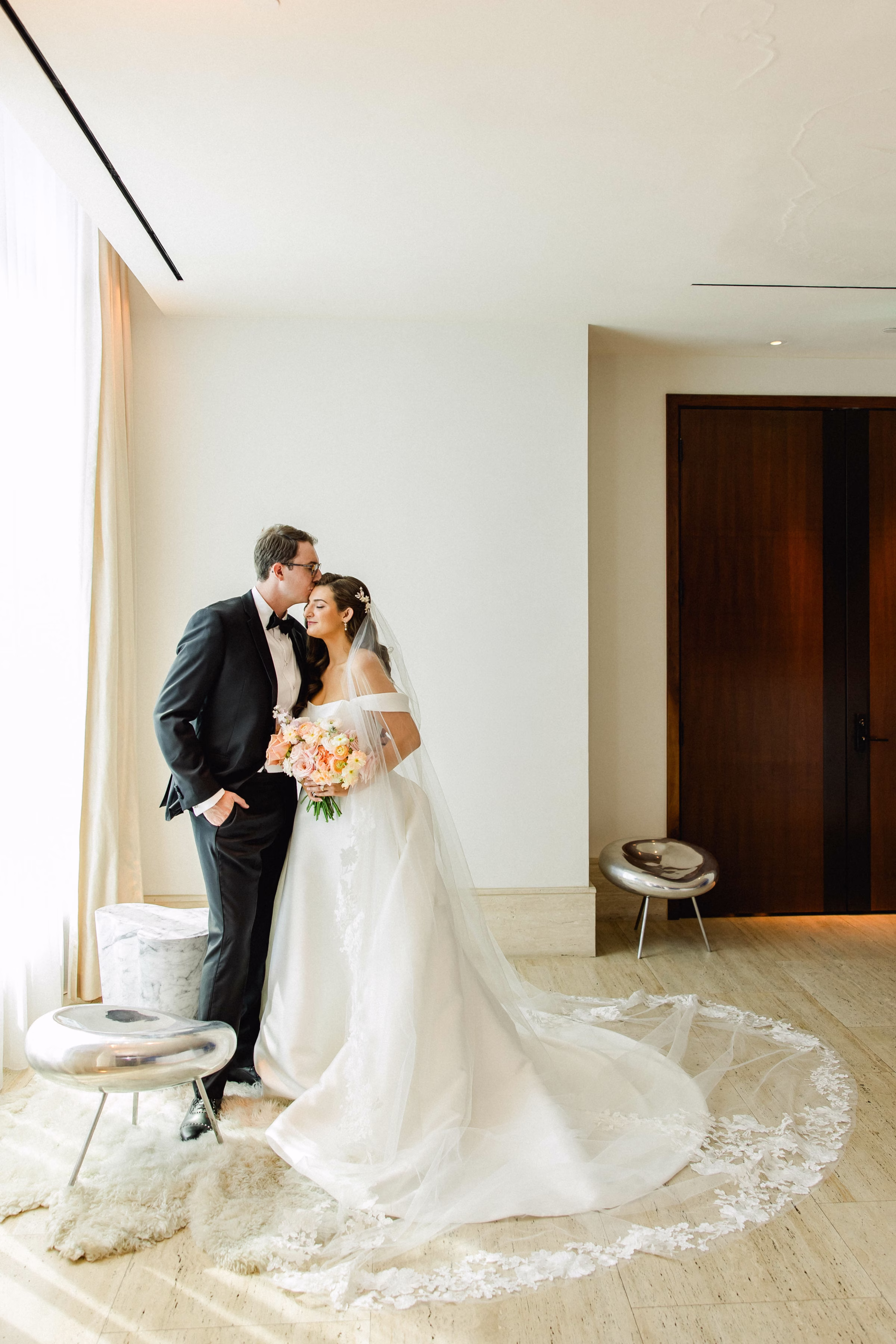 Bride and Groom Wedding Portrait | White Off the Shoulder Pronovias Wedding Gown with Long Train Inspiration | Traditional Floral Tulle Cathedral Length Veil Ideas