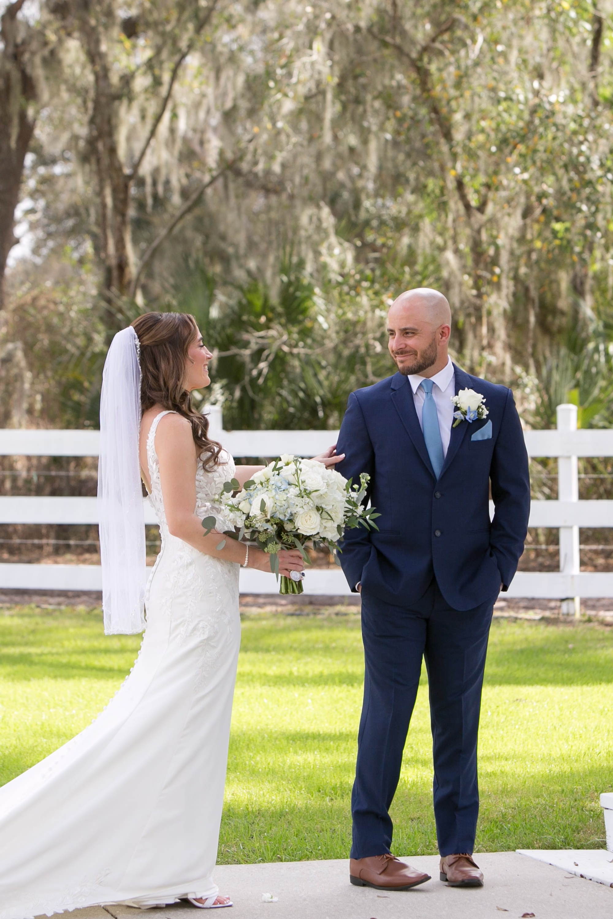 8Elegant Dusty Blue Rustic Wedding Ideas - Ivory and Dusty Blue Rustic Wedding | Lithia Acres Barn Bride and Groom First Look Wedding Portrait | Tampa Bay Photographer Carrie Wildes Photography Art and Design