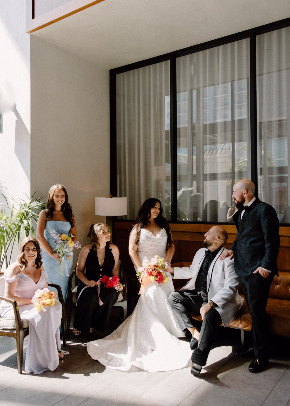 11Whimsical Pastel Spring Orange Yellow and Purple Wedding Inspiration - Whimsical, Colorful Waterfront Wedding | Tampa River Center Bride and Groom with Wedding Party Wedding Portrait | Different Style Color Spring Bridesmaid Dress Inspiration | Pastel Colorful Bridal Bouquet Ideas