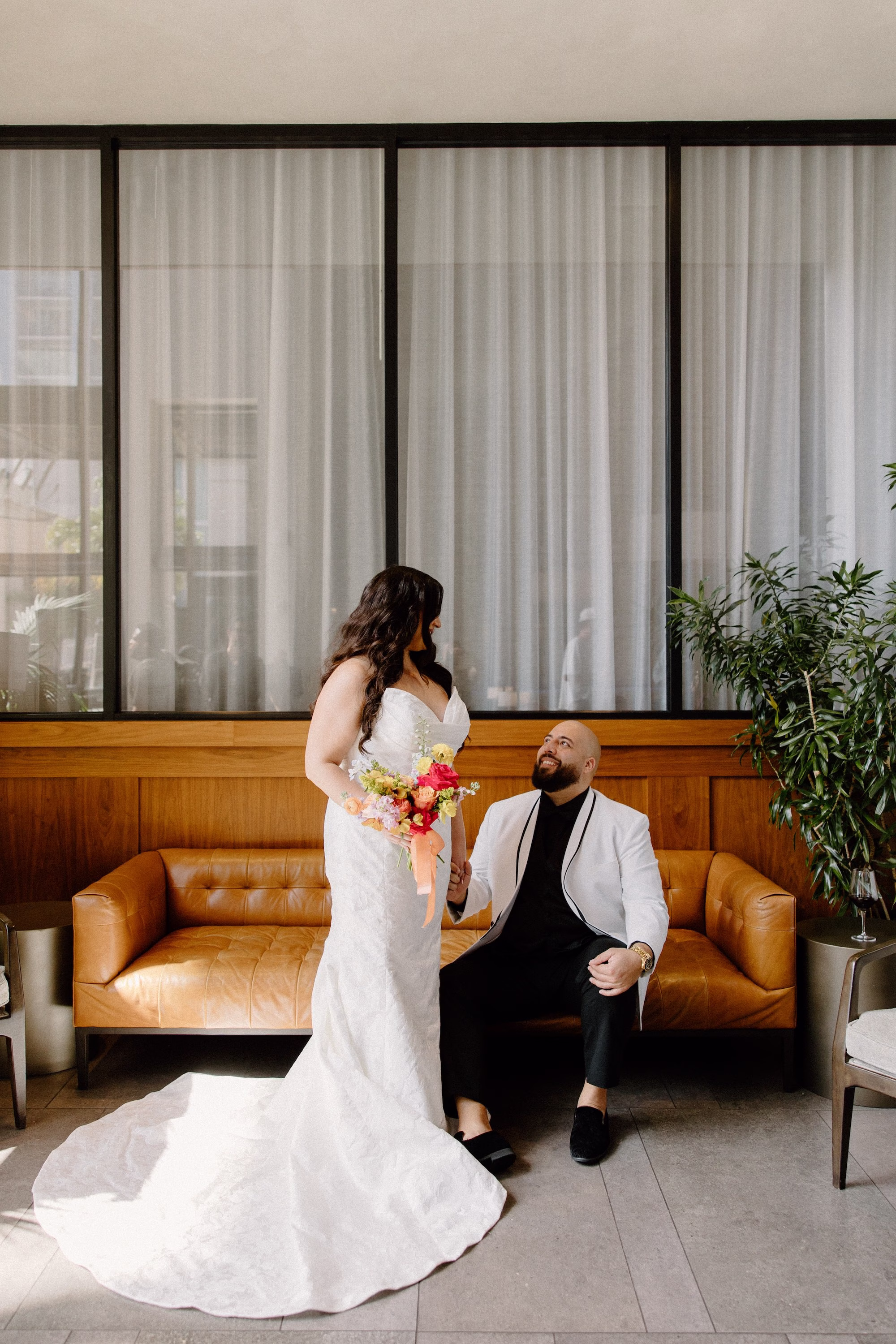 13Whimsical Pastel Spring Orange Yellow and Purple Wedding Inspiration - Whimsical, Colorful Waterfront Wedding | Tampa River Center Bride and Groom Wedding Portrait | Timeless Maggie Sottero White Wedding Gown with Train Inspiration | Colorful Bright Yellow, Baby Blue, Bright Pink, Orange, Blush, Lilac Spring Bridal Bouquet Ideas