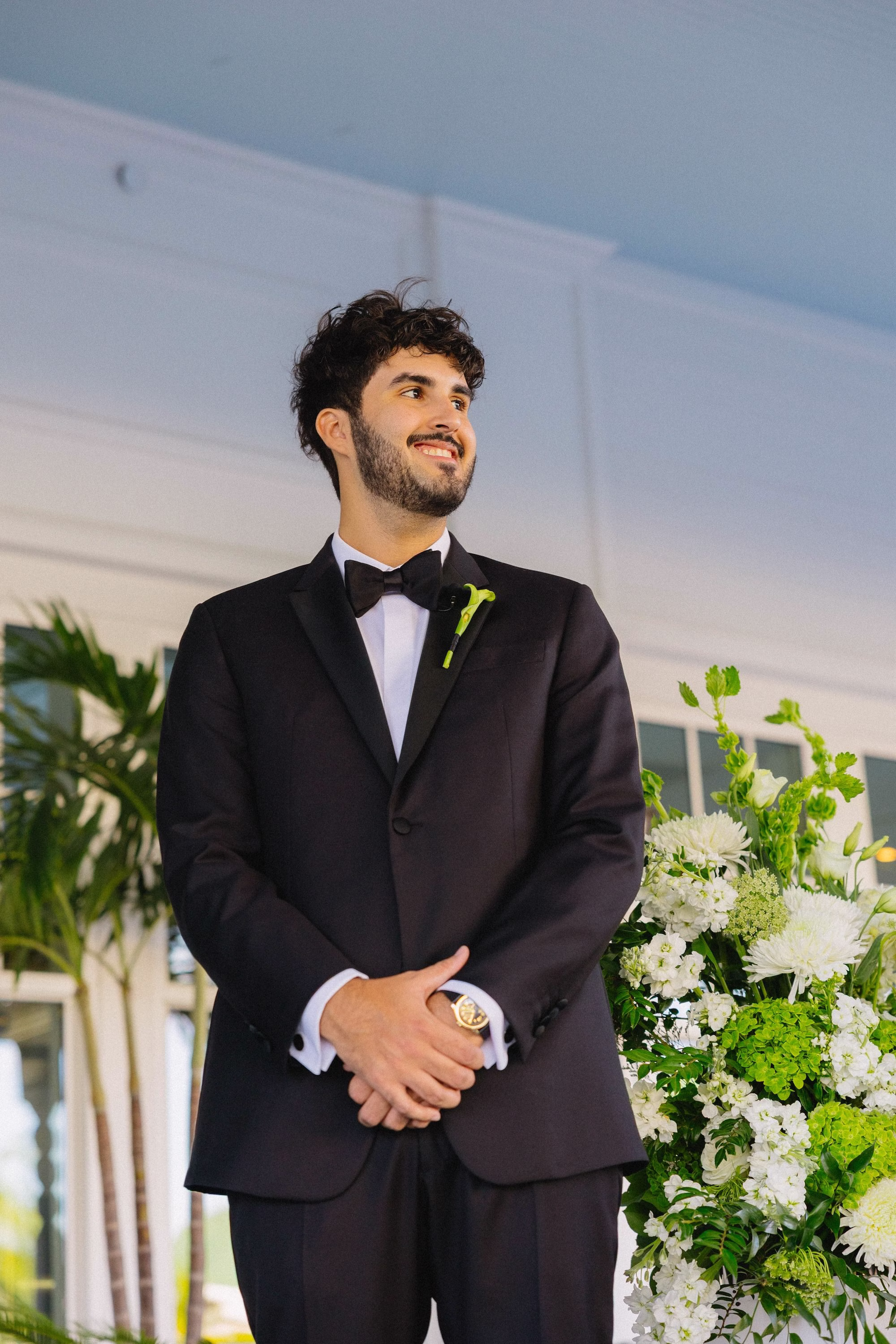 14Timeless Old Florida Green and White Wedding Inspiration - Timeless, Green and White Clearwater Wedding | The Belleview Inn Groom's Reaction to Bride Walking Down Wedding Aisle