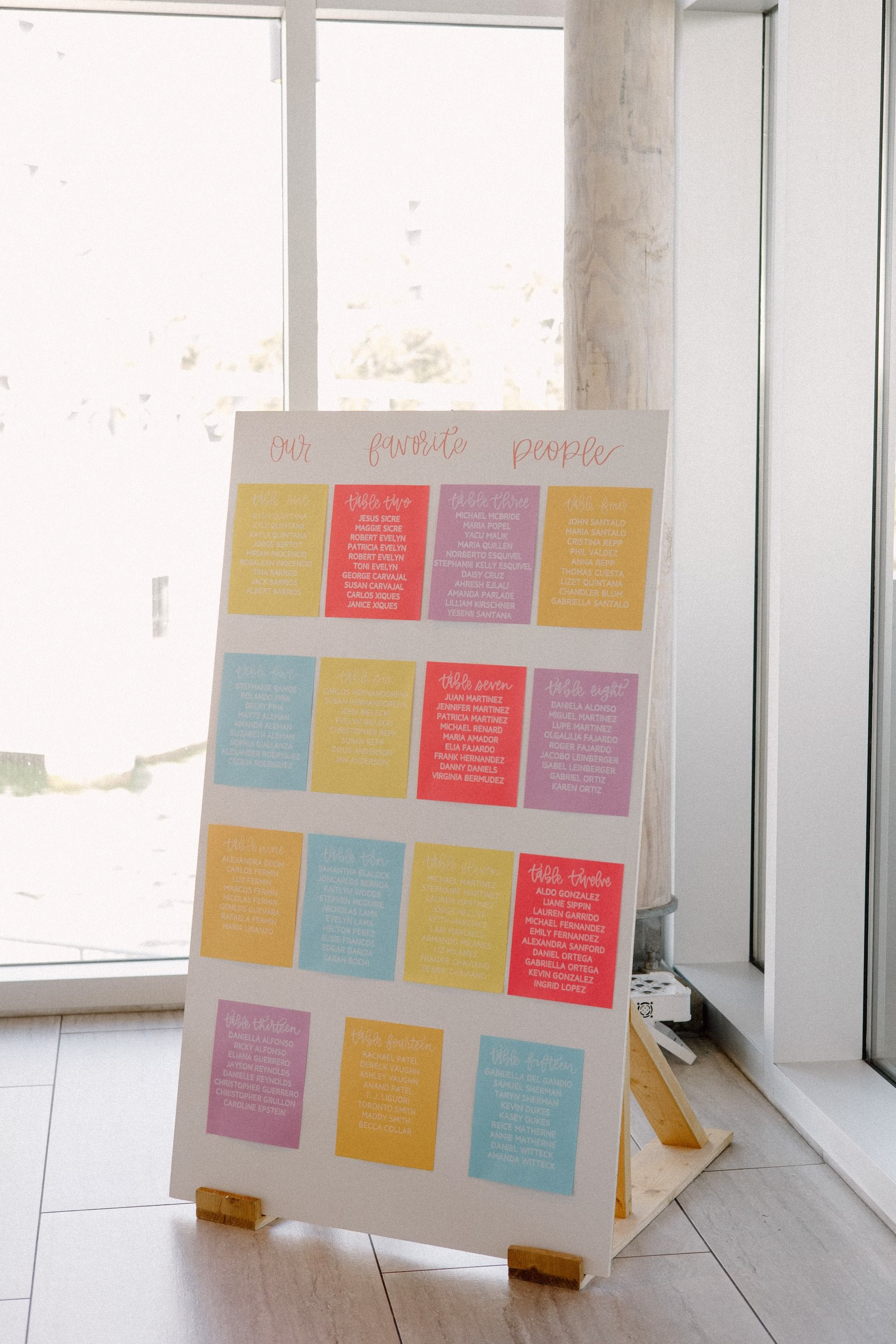 Modern Colorful Wedding Reception Seating Chart Sign Inspiration | Colorful Spring Pastel Bright Pink, Orange, Yellow, Lavender, Blush Whimsical Garden Wedding Decor Ideas | Tampa Bay Planner Wilder Mind Events | Florida Sign Designer madWOLFE