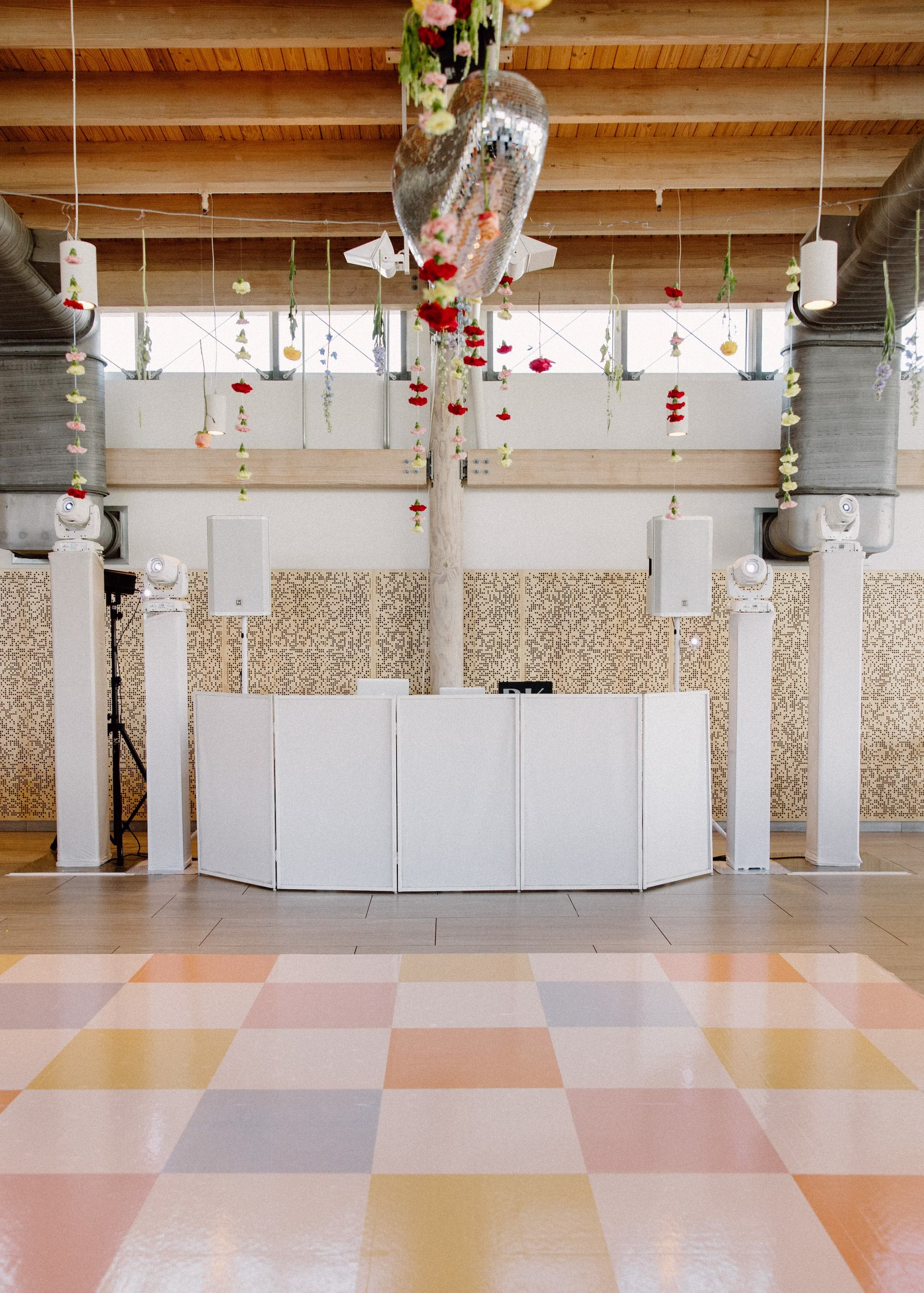 40Whimsical Pastel Spring Orange Yellow and Purple Wedding Inspiration - Whimsical, Colorful Waterfront Wedding | Tampa River Center Whimsical Spring Colorful Wedding Reception Decor Inspiration | Heart Wedding Reception Dance Floor Disco Ball Decor Ideas | Single Stem Spring Red, Pink, Yellow Florals Hanging Ceiling Decor Inspiration | Multi Color Checkered Dance Floor Ideas | Tampa Bay Planner Wilder Mind Events | Tampa Bay DJ Tampa Bay DJ Co