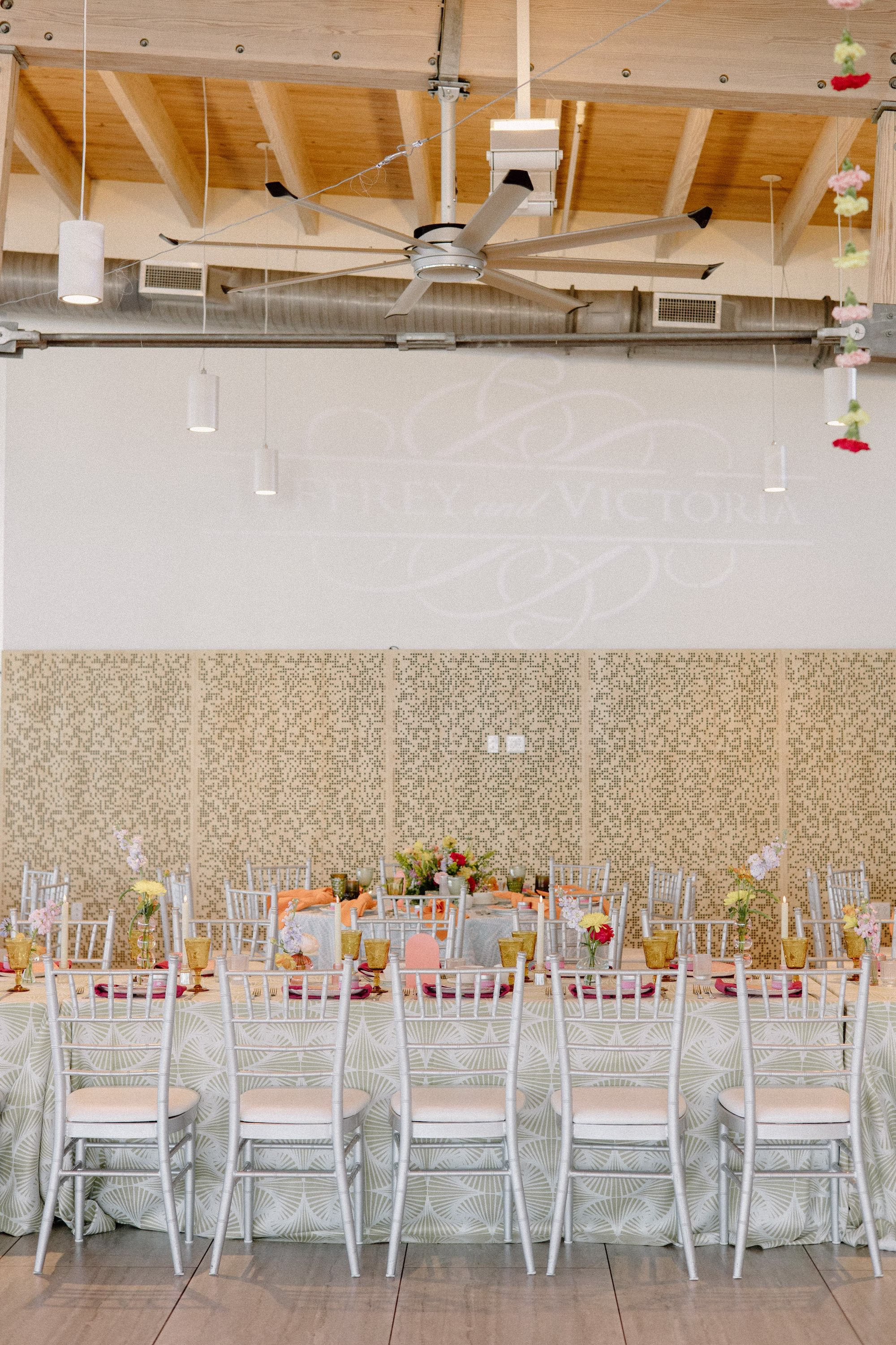 47Whimsical Pastel Spring Orange Yellow and Purple Wedding Inspiration - Whimsical, Colorful Waterfront Wedding | Tampa River Center Whimsical Spring Colorful Wedding Reception Decor Inspiration | Heart Wedding Reception Dance Floor Disco Ball Decor Ideas | Single Stem Spring Red, Pink, Yellow Florals Hanging Ceiling Decor Inspiration | Tampa Bay Planner Wilder Mind Events