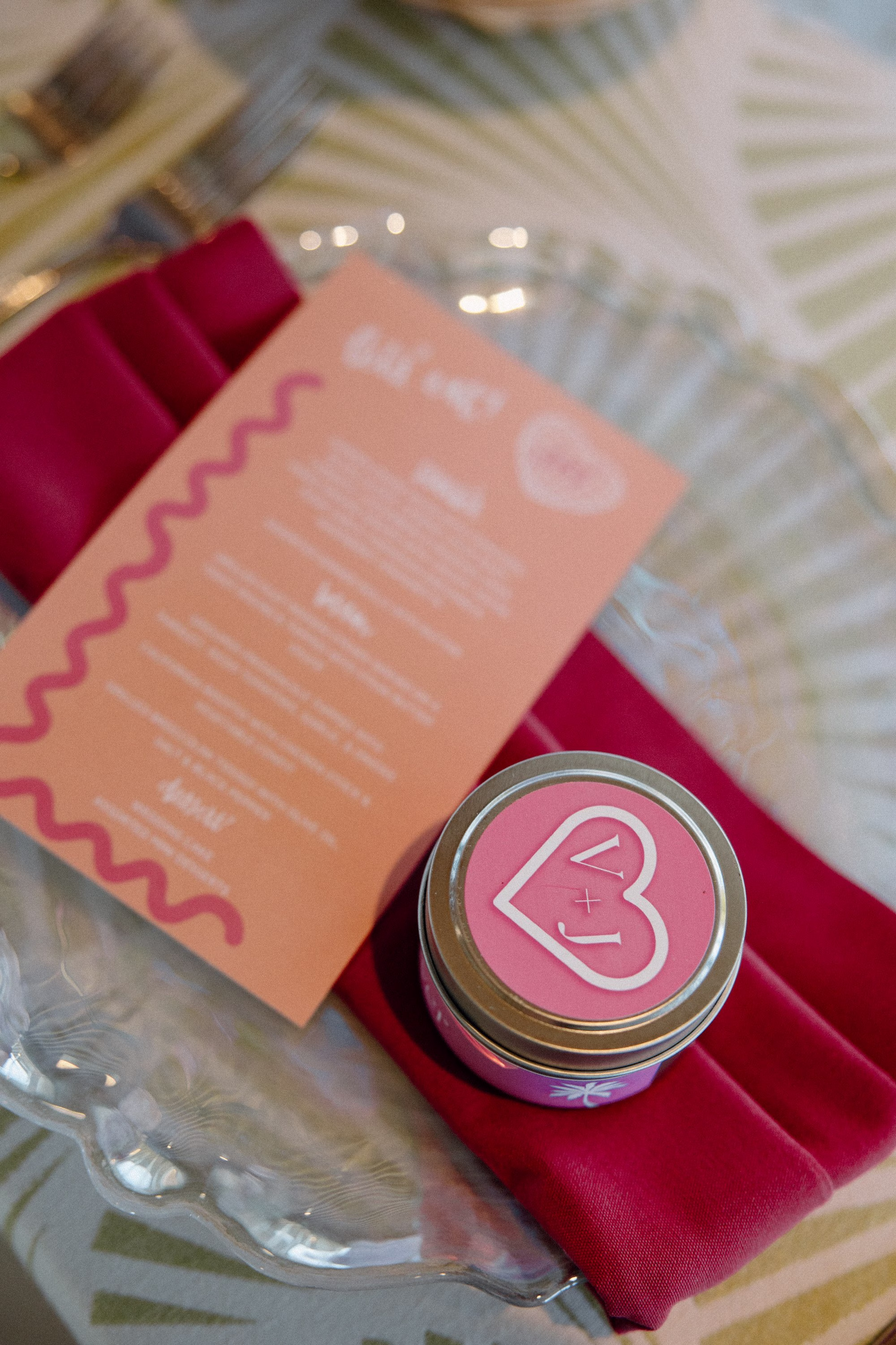 49Whimsical Pastel Spring Orange Yellow and Purple Wedding Inspiration - Whimsical, Colorful Waterfront Wedding | Tampa River Center Colorful Whimsical Orange and Red Wedding Reception Menu Card Iridescent Charger Tablescape Decor Inspiration | Bright Pink Napkin with Personalized Wedding Favor Ideas | Planner Wilder Mind Events