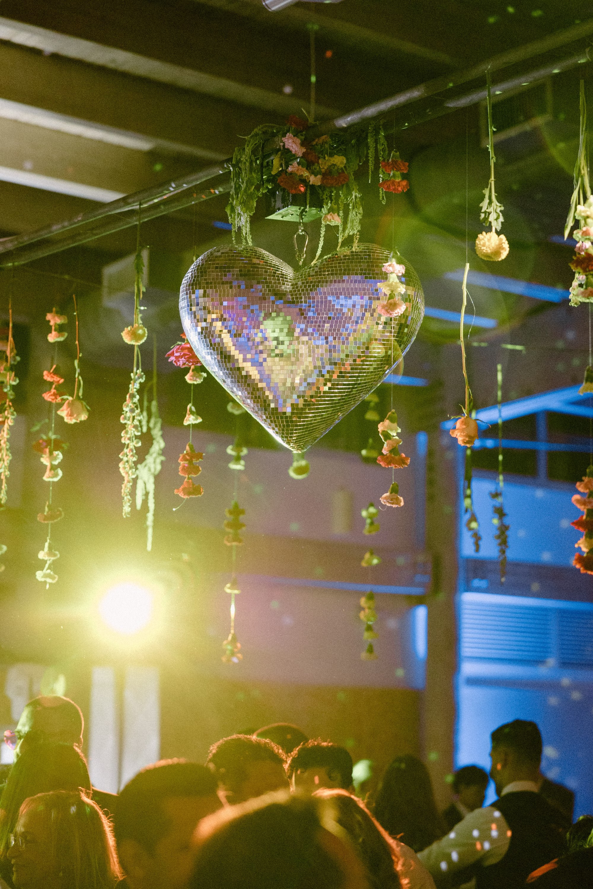 54Whimsical Pastel Spring Orange Yellow and Purple Wedding Inspiration - Whimsical, Colorful Waterfront Wedding | Tampa River Center Heart Wedding Reception Dance Floor Disco Ball Decor Ideas | Single Stem Spring Red, Pink, Yellow Florals Hanging Ceiling Decor Inspiration | Tampa Bay Planner Wilder Mind Events | Tampa Bay DJ Tampa Bay DJ Co