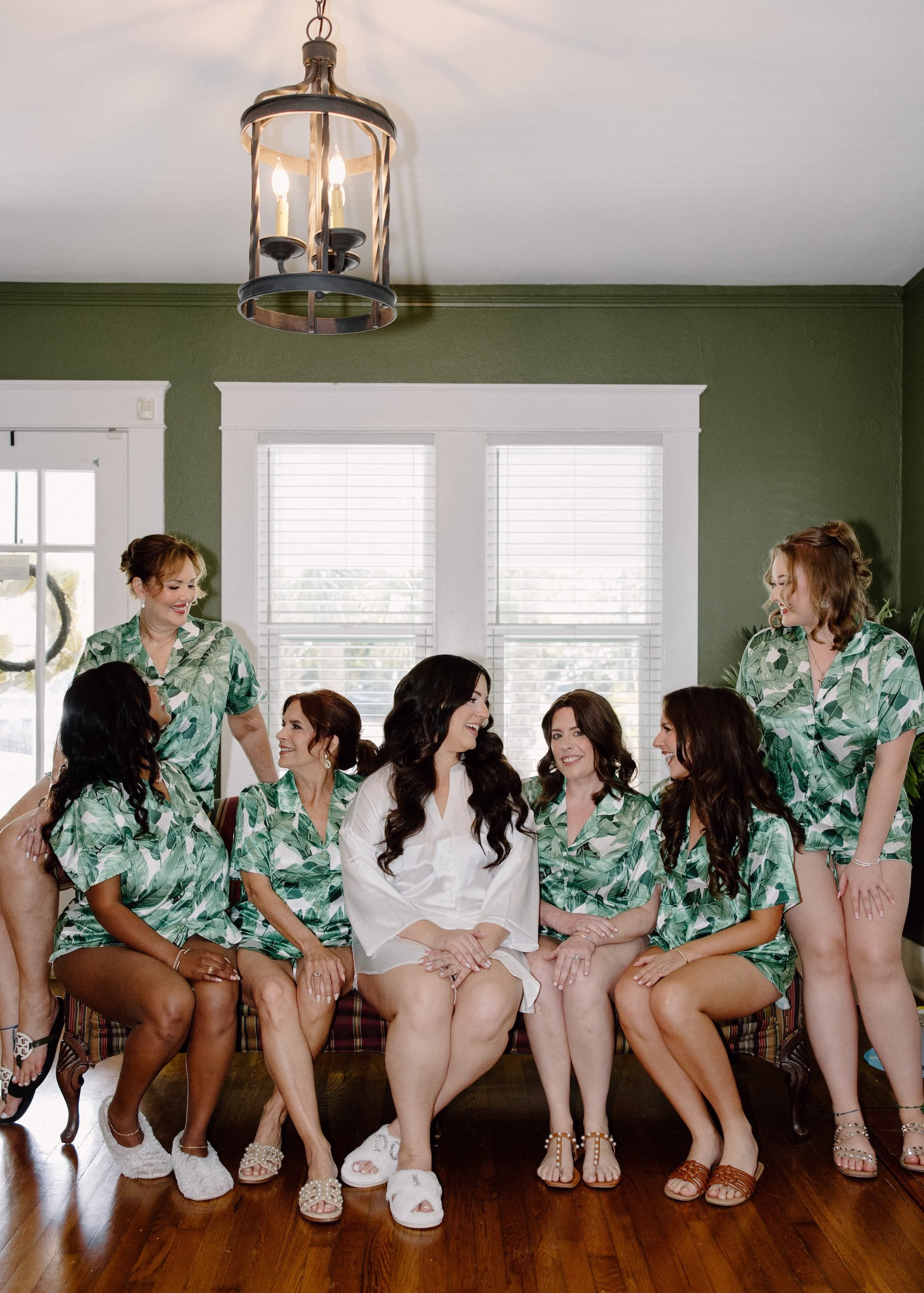 5Whimsical Pastel Spring Orange Yellow and Purple Wedding Inspiration - Whimsical, Colorful Waterfront Wedding | Tampa River Center Bride and Bridesmaids Getting Ready Wedding Portrait in Palm Pajama Sets
