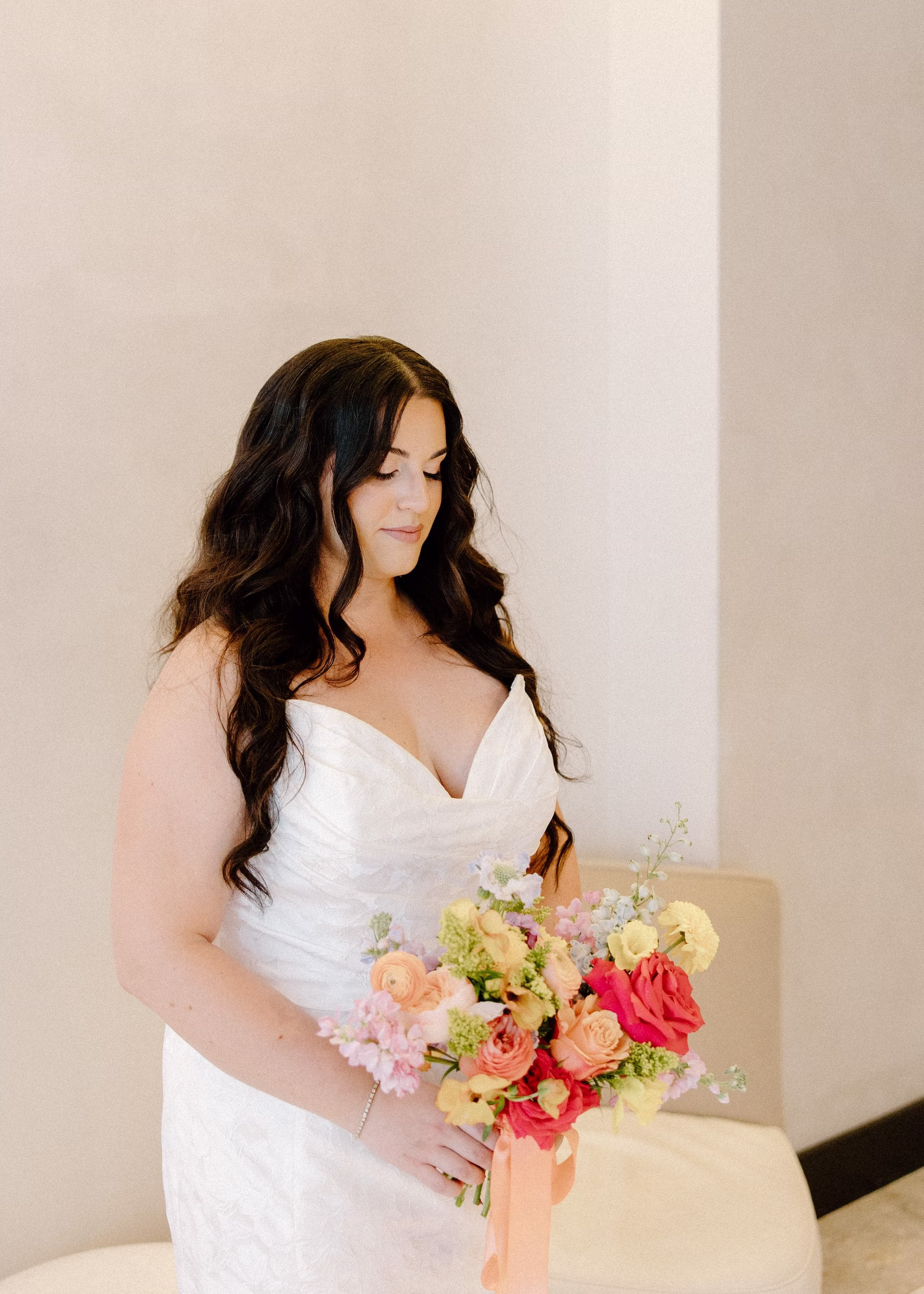 6Whimsical Pastel Spring Orange Yellow and Purple Wedding Inspiration - Whimsical, Colorful Waterfront Wedding | Tampa River Center Bride Wedding Portrait | White Strapless Sweetheart Neckline Wedding Gown Inspiration | Colorful Spring Whimsical Bridal Bouquet of Pink, Yellow, Orange, Roses with Greenery Ideas