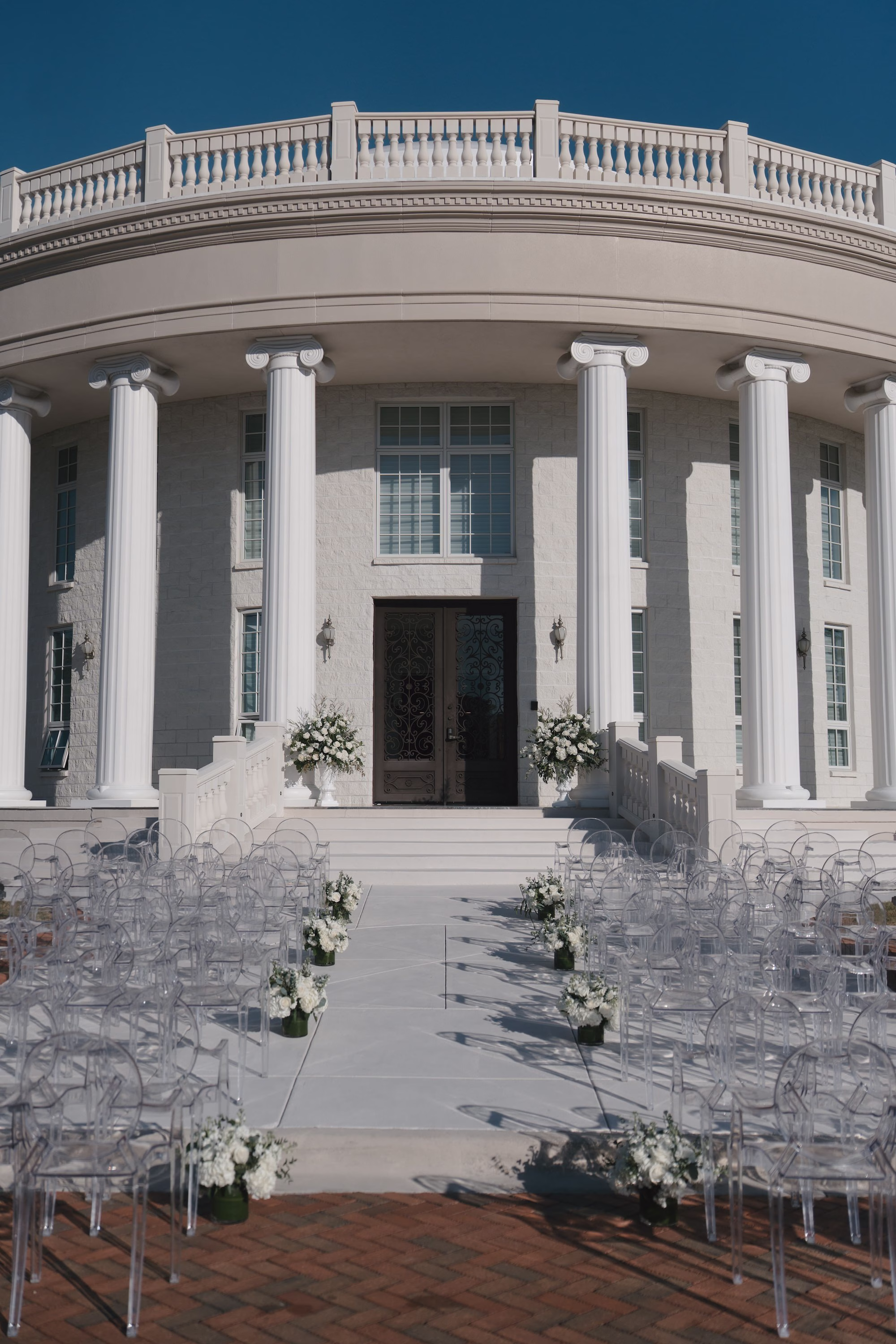 Elegant Ivory Wedding Ceremony Decor Inspiration | Clear Acrylic Ghost Ceremony Chairs Ideas | Tarpon Springs Event Venue Whitehurst Gallery