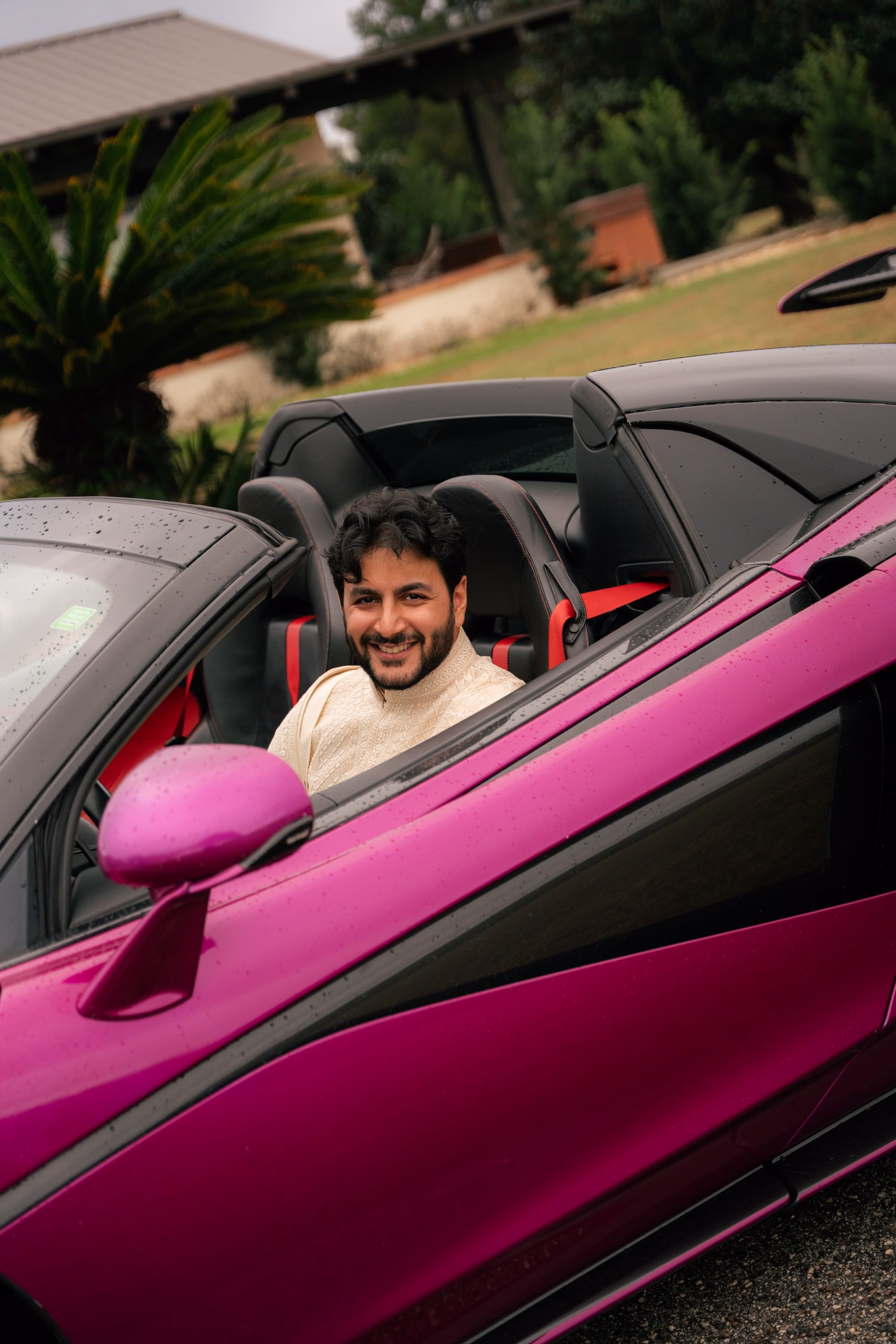 Groom In Pink Corvette Wedding Portrait
