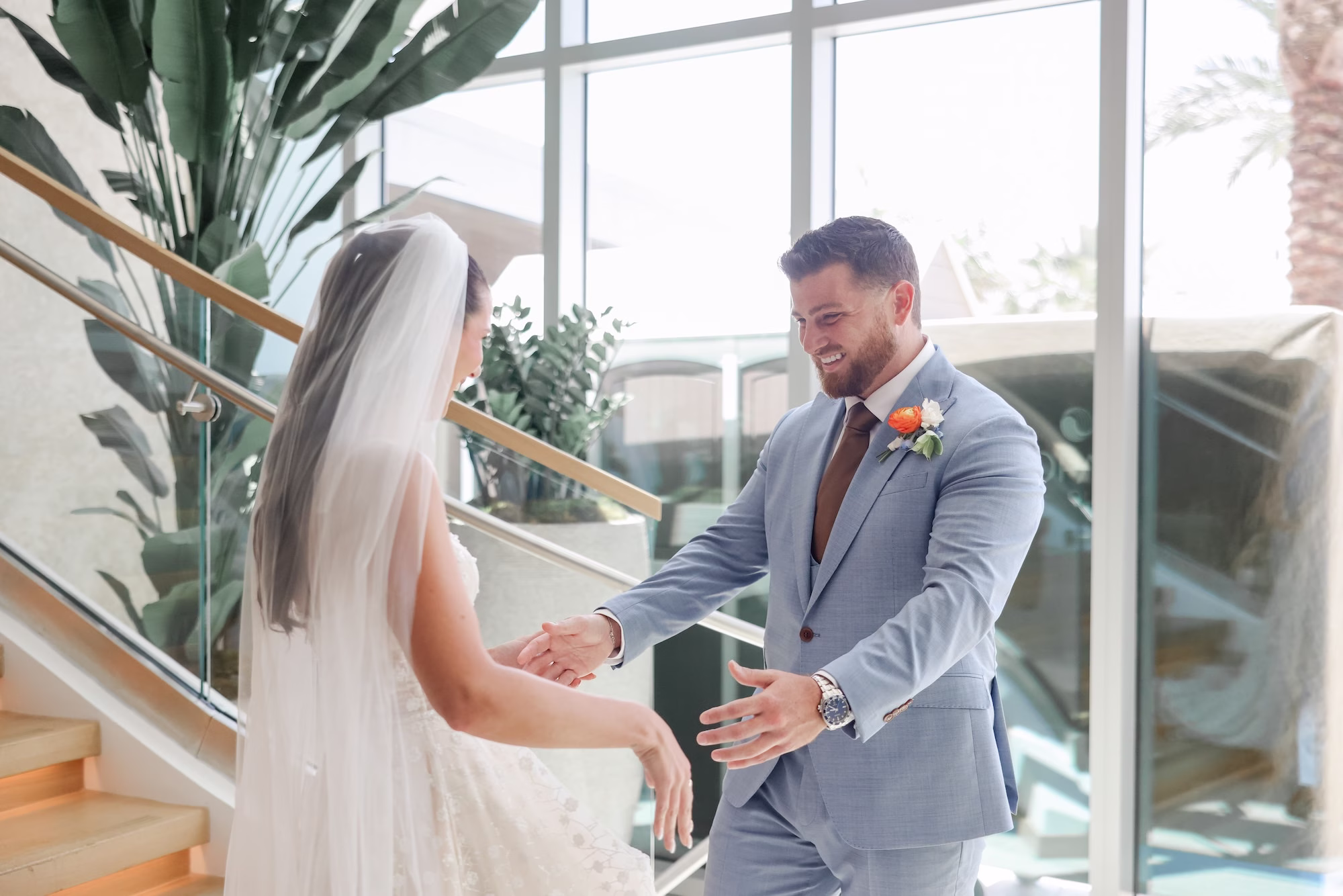 13Tropical Pastel Florida Wedding Inspiration - Tropical, Pastel Outdoor Wedding | Opal Sands Clearwater Beach Bride and Groom First Look Wedding Portrait