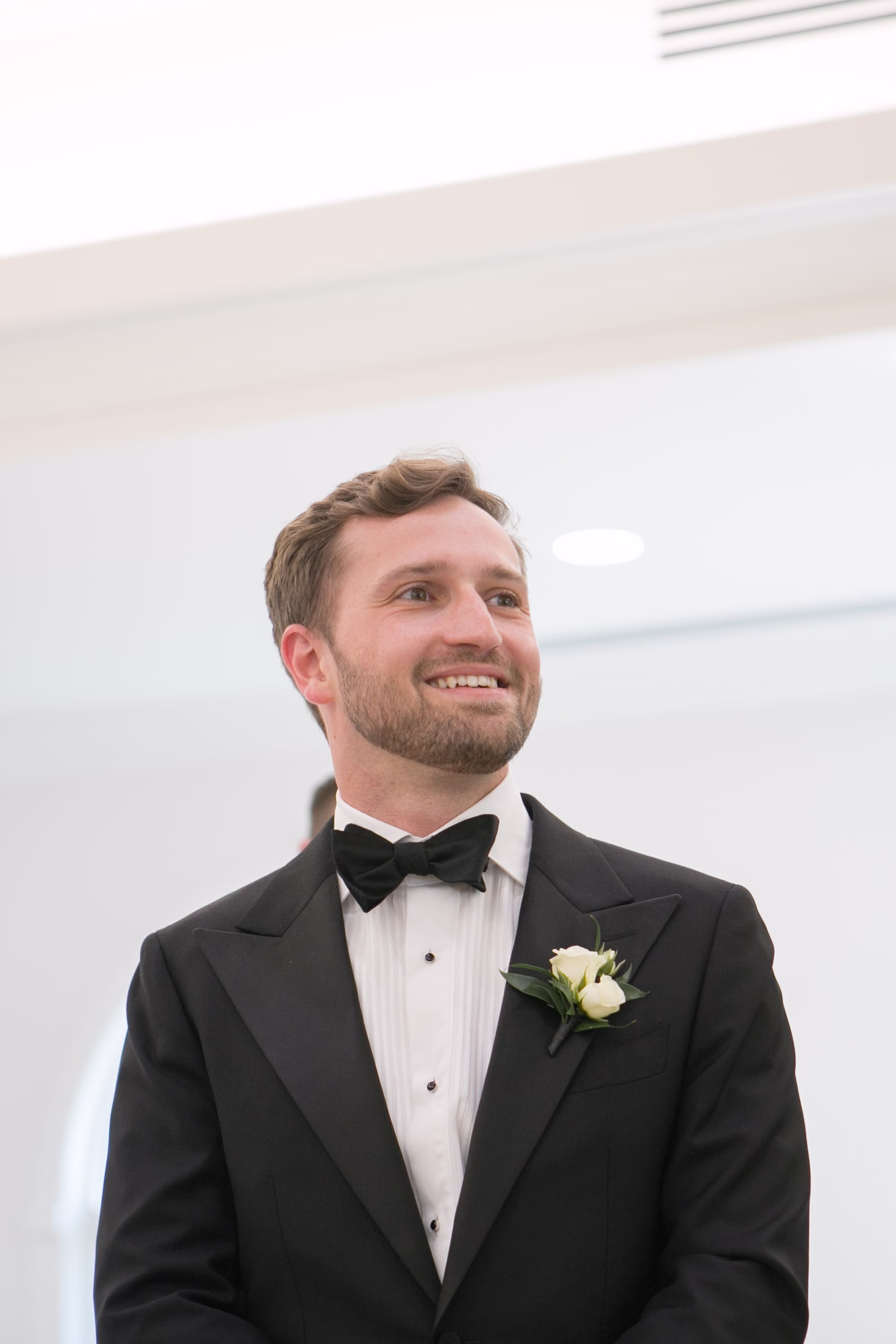 14Classic Black and White Wedding Ideas - Classic Black and White Clearwater Wedding | Harborside Chapel & The Fenway Groom's Reaction to Bride Walking Down Wedding Ceremony Aisle | Tampa Bay Photographer Carrie Wildes Photography Art and Design