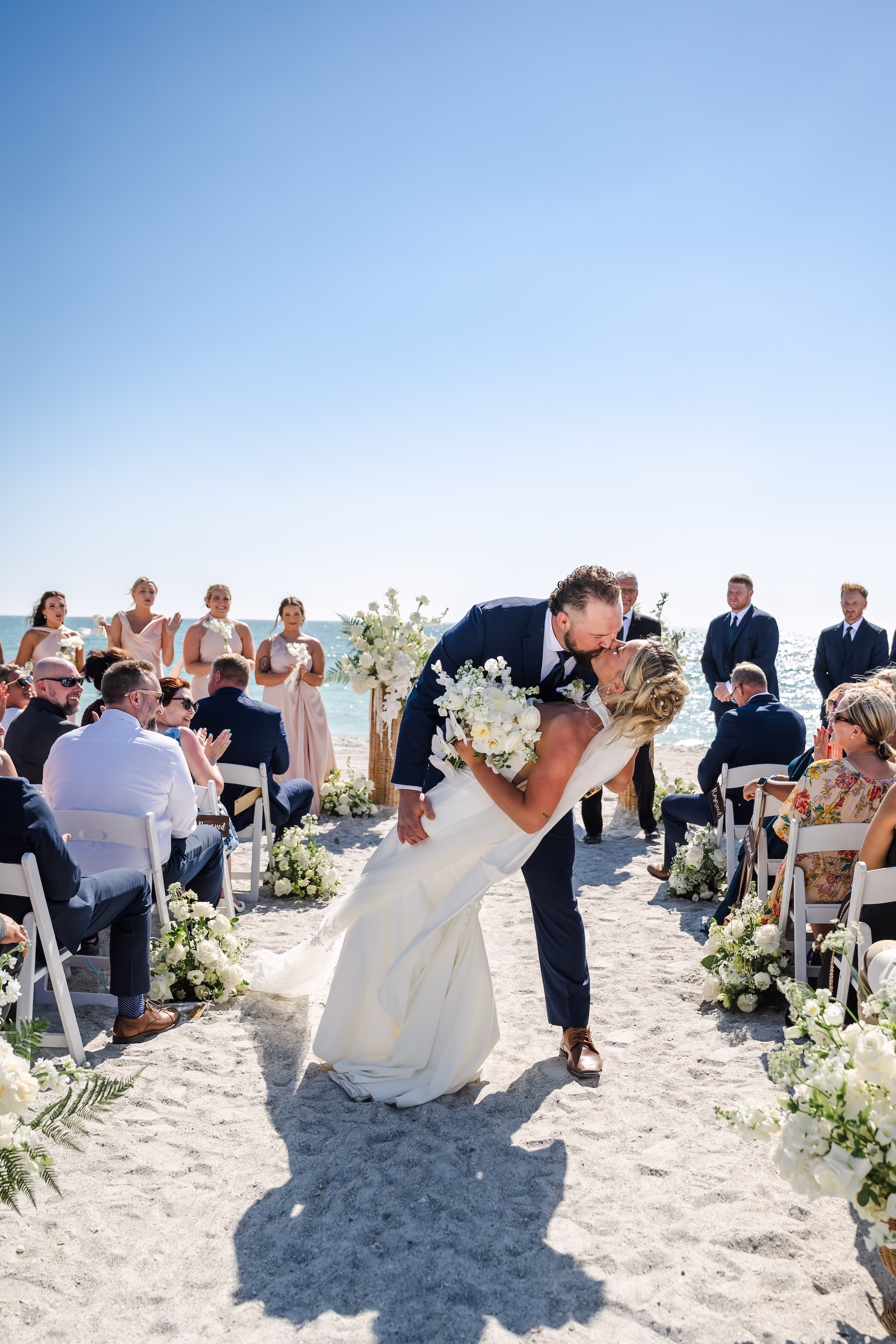 15Elegant Florida Boho Wedding Ideas - Elegant, Destination Sarasota Wedding | Lido Beach Resort Bride and Groom Wedding Portrait | Sarasota Photographer and Videographer Iyrus Weddings