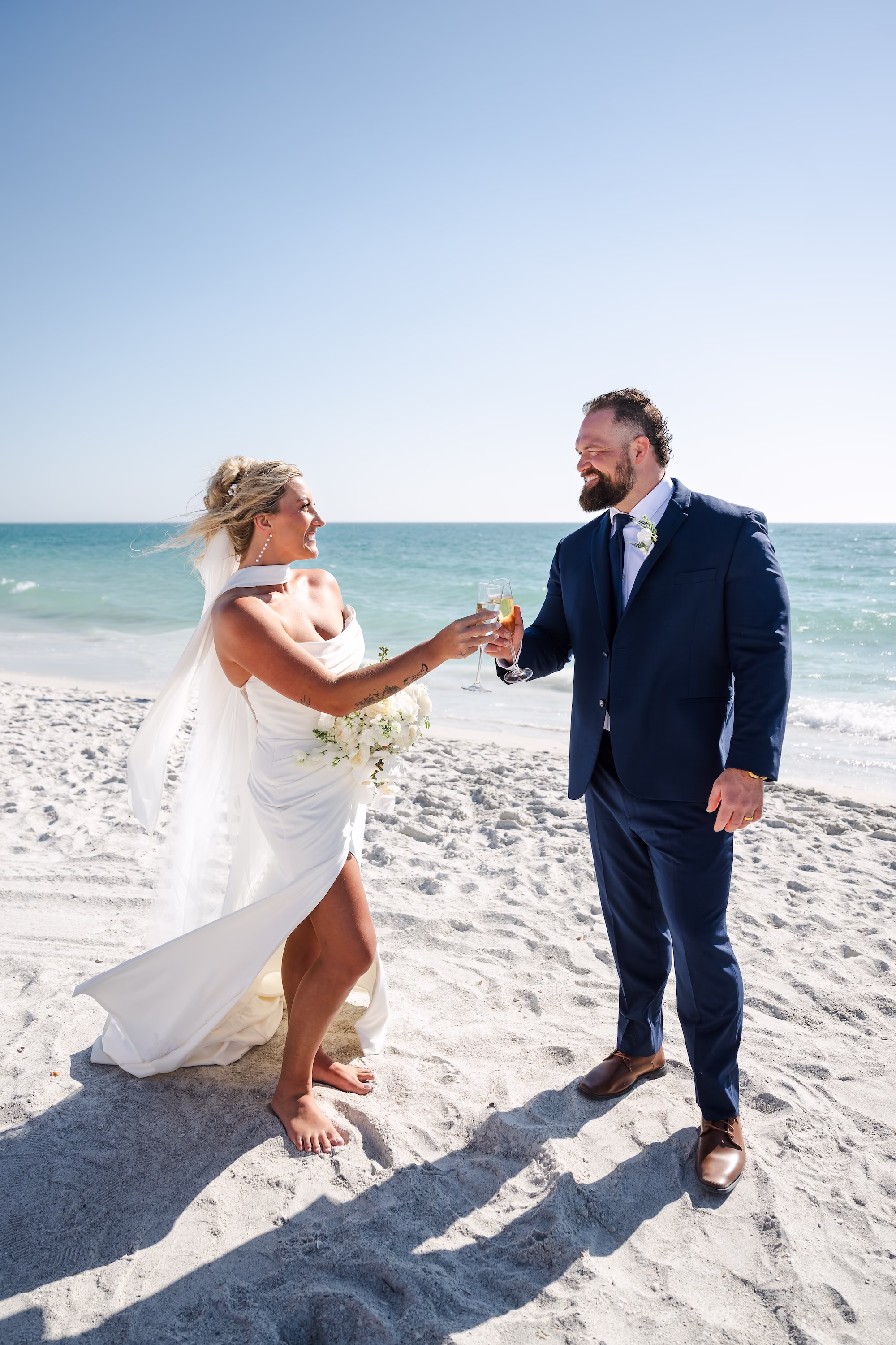 17Elegant Florida Boho Wedding Ideas - Elegant, Destination Sarasota Wedding | Lido Beach Resort Bride and Groom Wedding Portrait | Sarasota Photographer and Videographer Iyrus Weddings