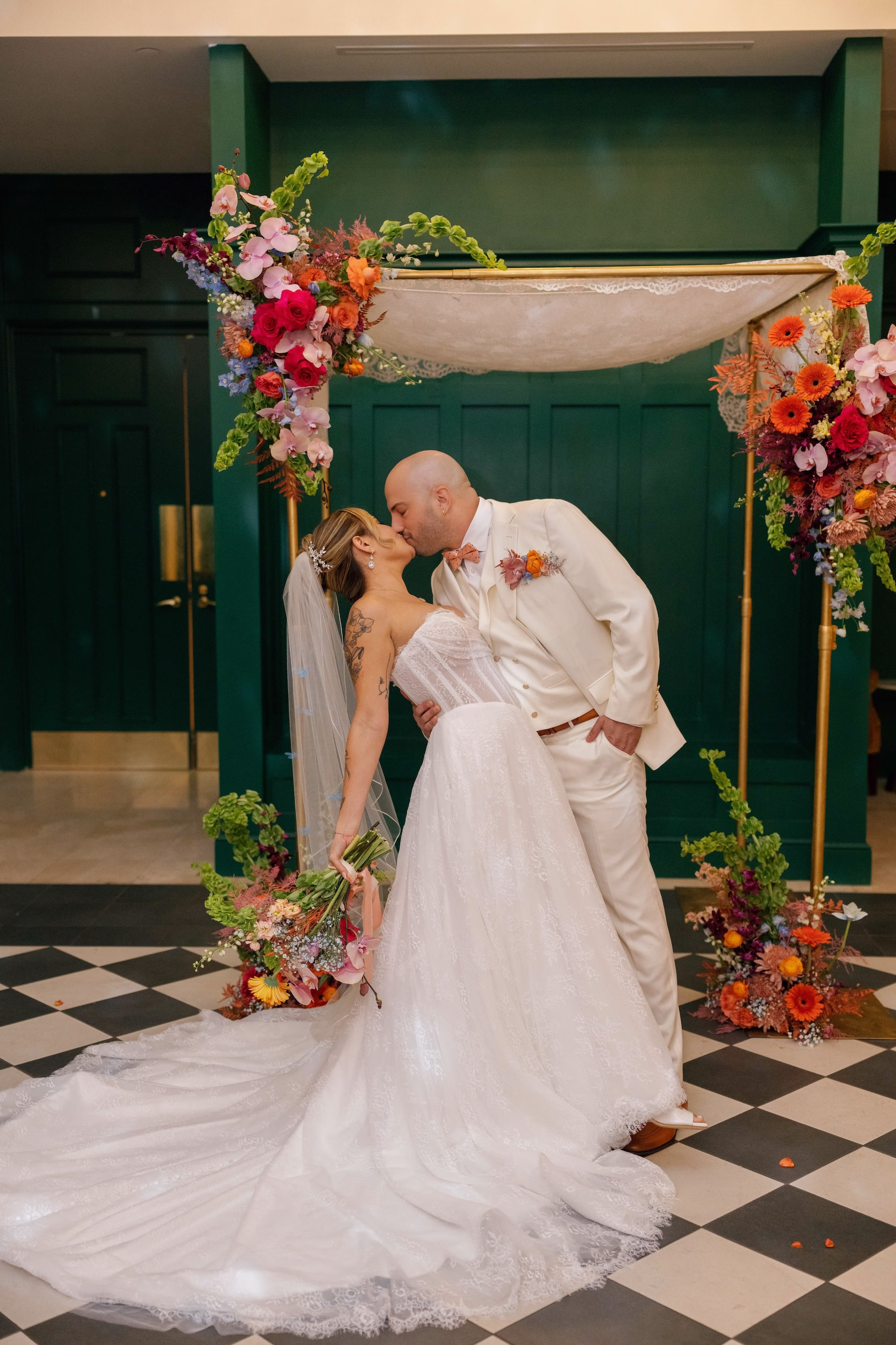 Bride and Groom First Kiss Wedding Portrait
