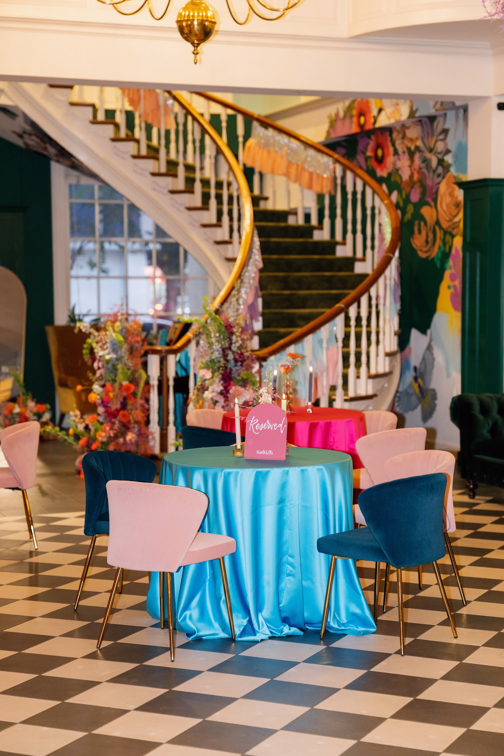Whimsical Vibrant Wedding Reception Decor Ideas | Tampa Bay Signage madWOLFE Designs | Event Venue Spiral Staircase