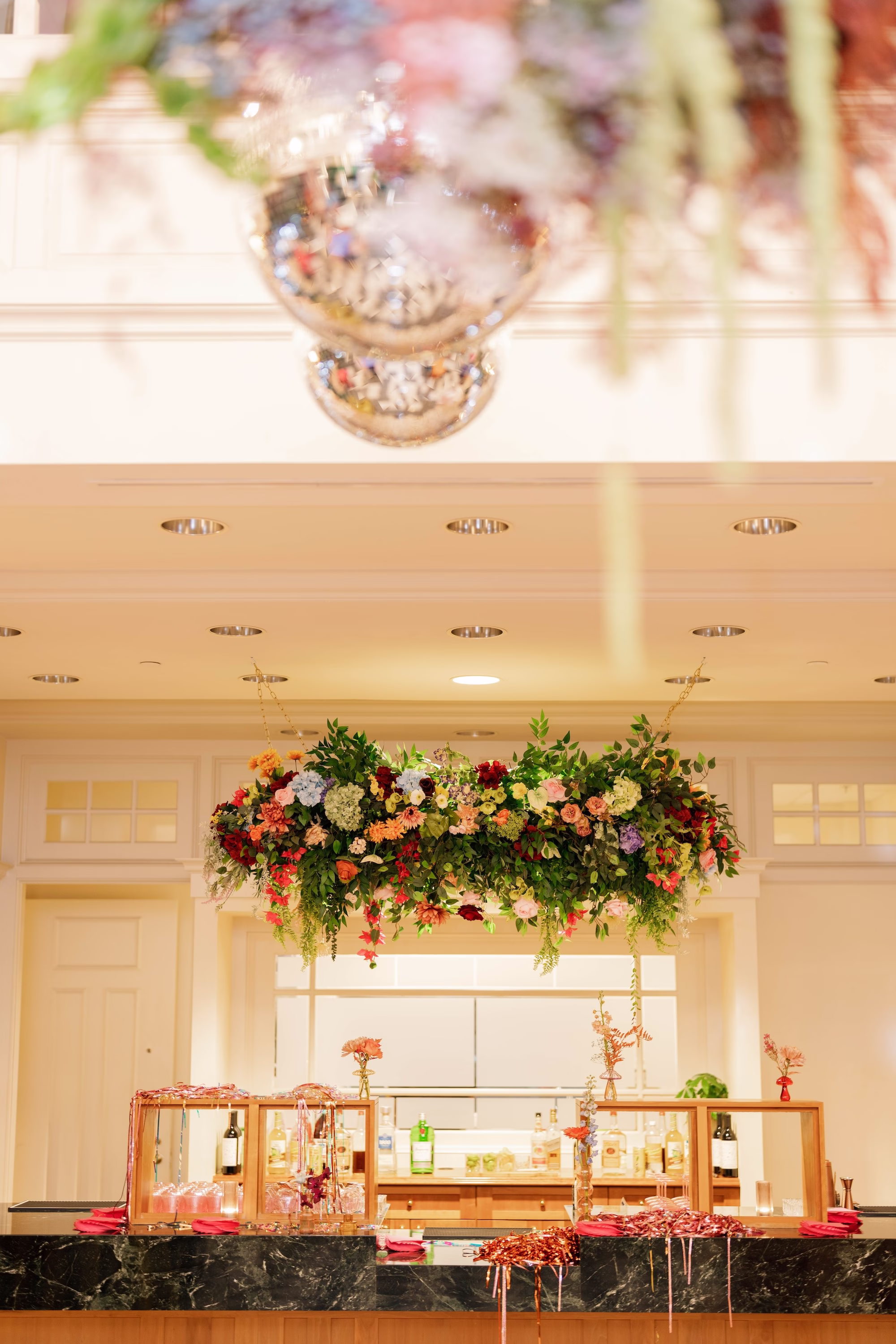 Whimsical Vibrant Wedding Reception Floral Chandelier Bar Decor Ideas | Tampa Bay Event Venue Spiral Staircase