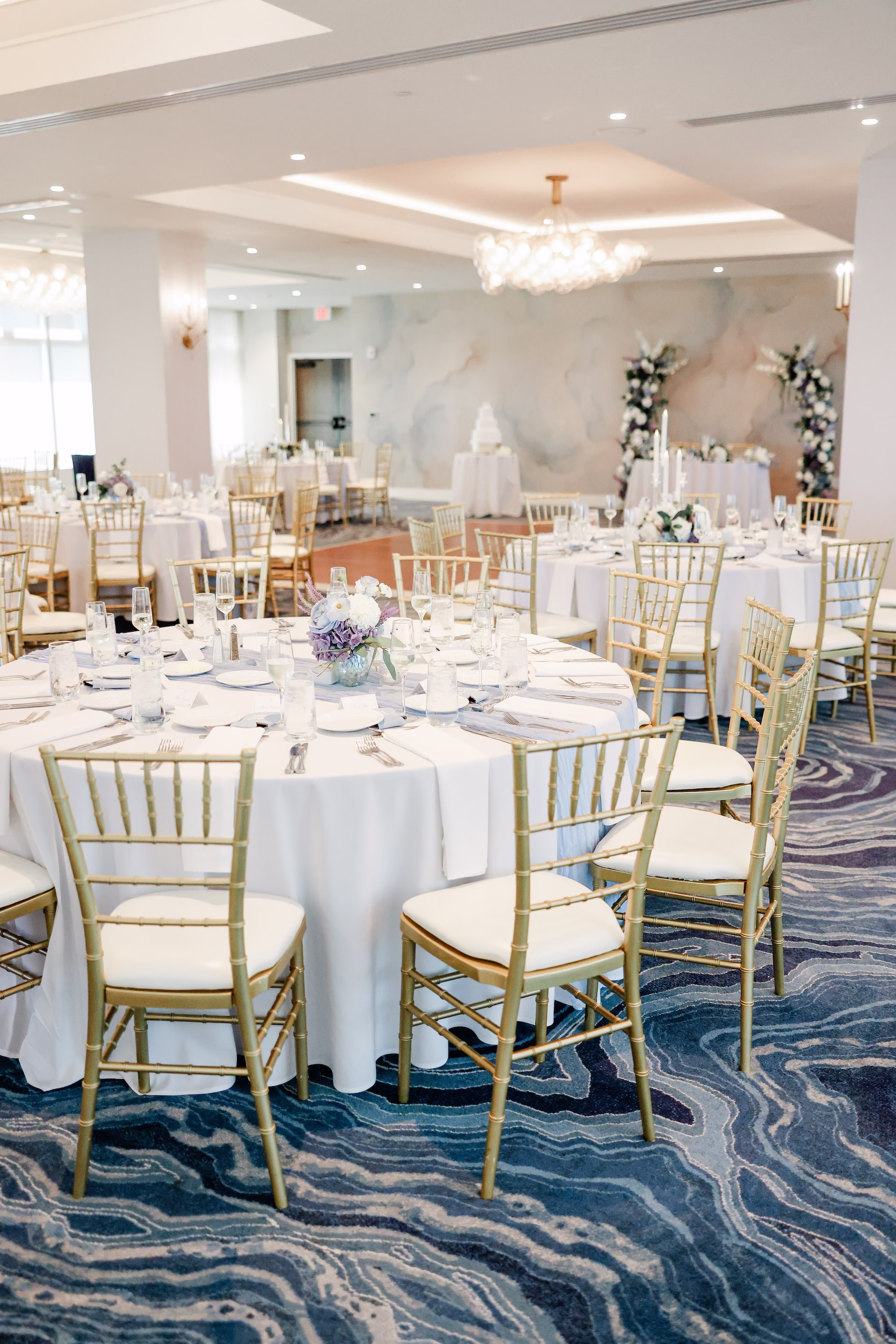 Luxurious Ballroom Coastal Wedding Reception | Modern Gold Chiavari Chairs | Romantic Taper Candle Centerpieces with Lush White and Blue Hydrangeas and Roses Flower Arrangement Ideas | Wedding Venue Grand Hyatt Tampa Bay
