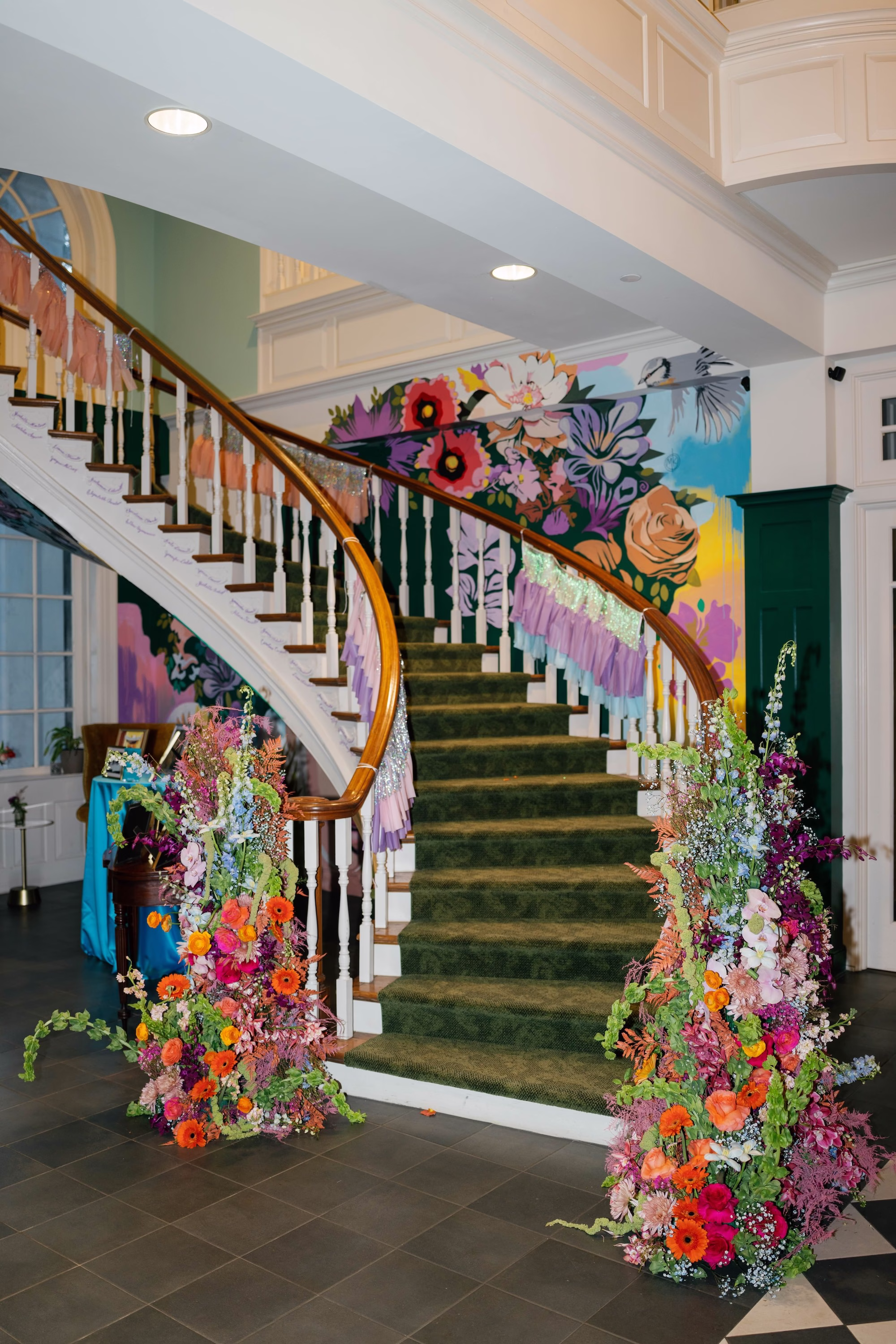 Whimsical Vibrant Wedding Reception Flower Decor Inspiration | Tampa bay Event Venue Spiral Staircase
