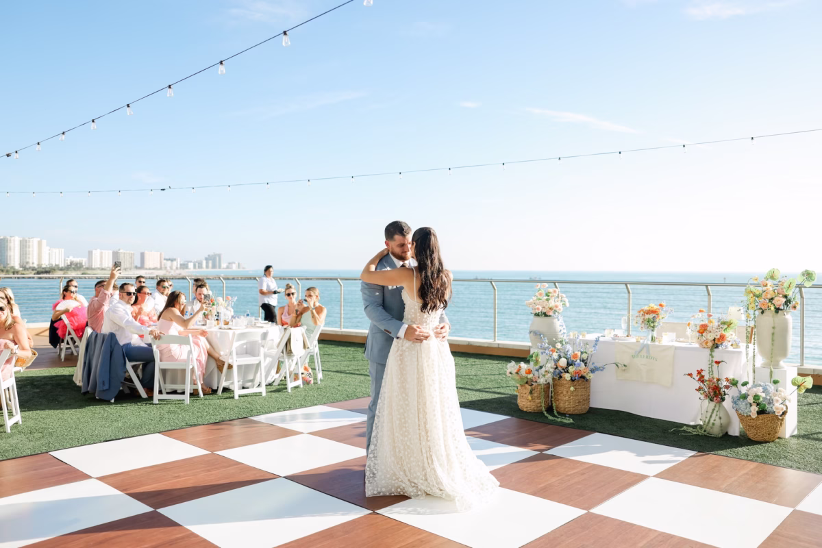 53Tropical Pastel Florida Wedding Inspiration Clearwater Beach Venue Opal Sands - Tropical, Pastel Outdoor Wedding | Opal Sands Clearwater Beach Bride and Groom First Dance Wedding Portrait | Clearwater Beach Event Venue Opal Sands | Photographer Lifelong Photography Studio | Rentals Gabro Event Services