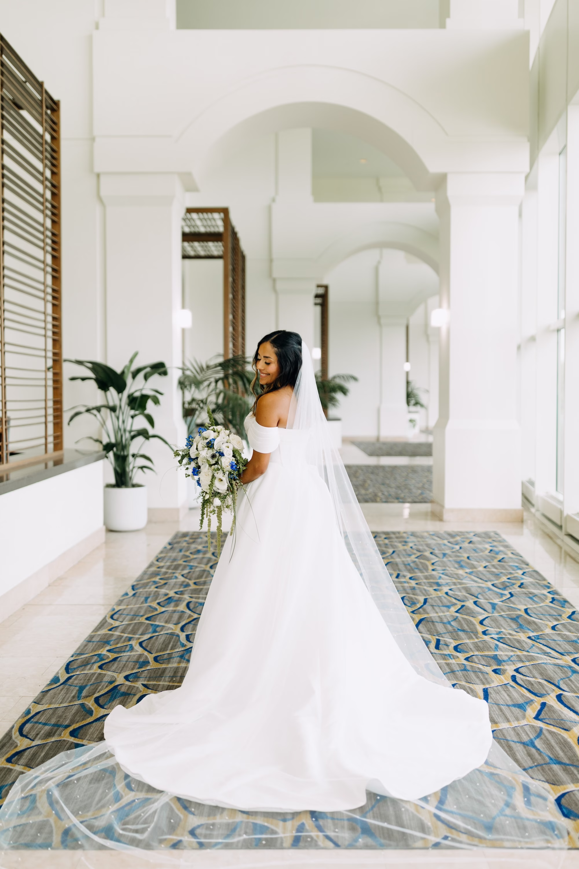 6Modern Blue Coastal Wedding Inspiration - Coastal Dusty Blue Waterfront Wedding Inspiration | Grand Hyatt Tampa Bay Bridal Wedding Portrait | White and Blue Bridal Wedding Bouquet | White Wedding Dress Inspiration | Tampa Florist La Maison des Fleurs | Boutique Truly Forever Bridal