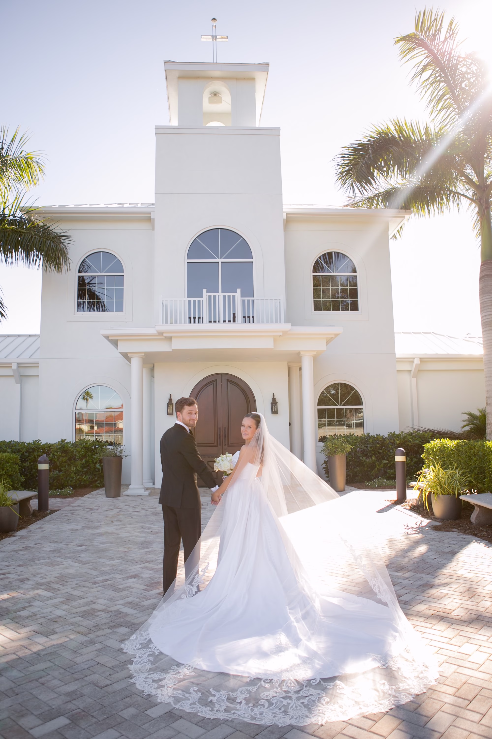 7Classic Black and White Wedding Ideas Tampa Bay Venue Harborside Chapel - Classic Black and White Clearwater Wedding | Harborside Chapel & The Fenway Bride and Groom Outdoor Florida Winter Wedding Portrait | Timeless Monochromatic White Roses Bridal Bouquet Inspiration | Elegant Cathedral Length Lace Detail Veil Ideas | Tampa Bay Photographer Carrie Wildes Photography Art and Design | Safety Harbor Event Venue Harborside Chapel