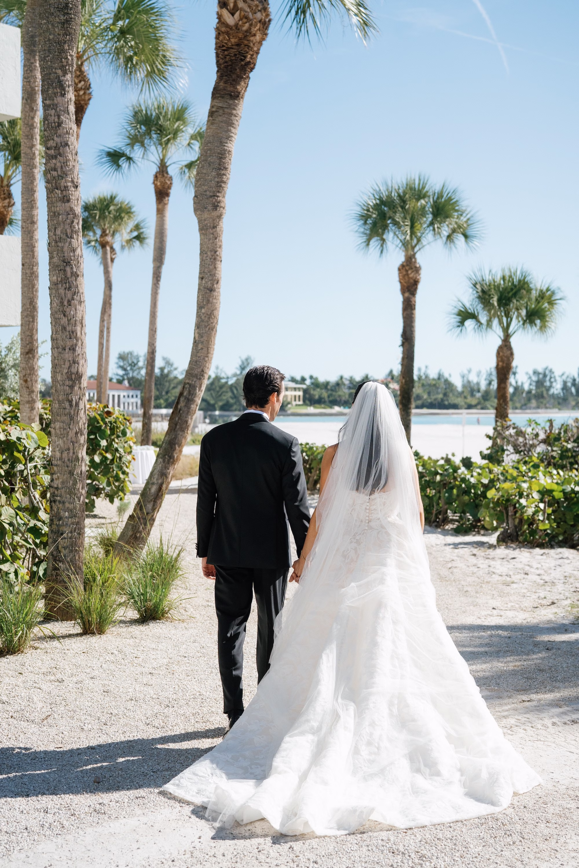 10Coastal Nancy Meyers Inspired Florida Beach Wedding - Coastal Blue, White, and Green Sarasota Wedding | The Resort at Longboat Key Club Bride and Groom Wedding Portrait