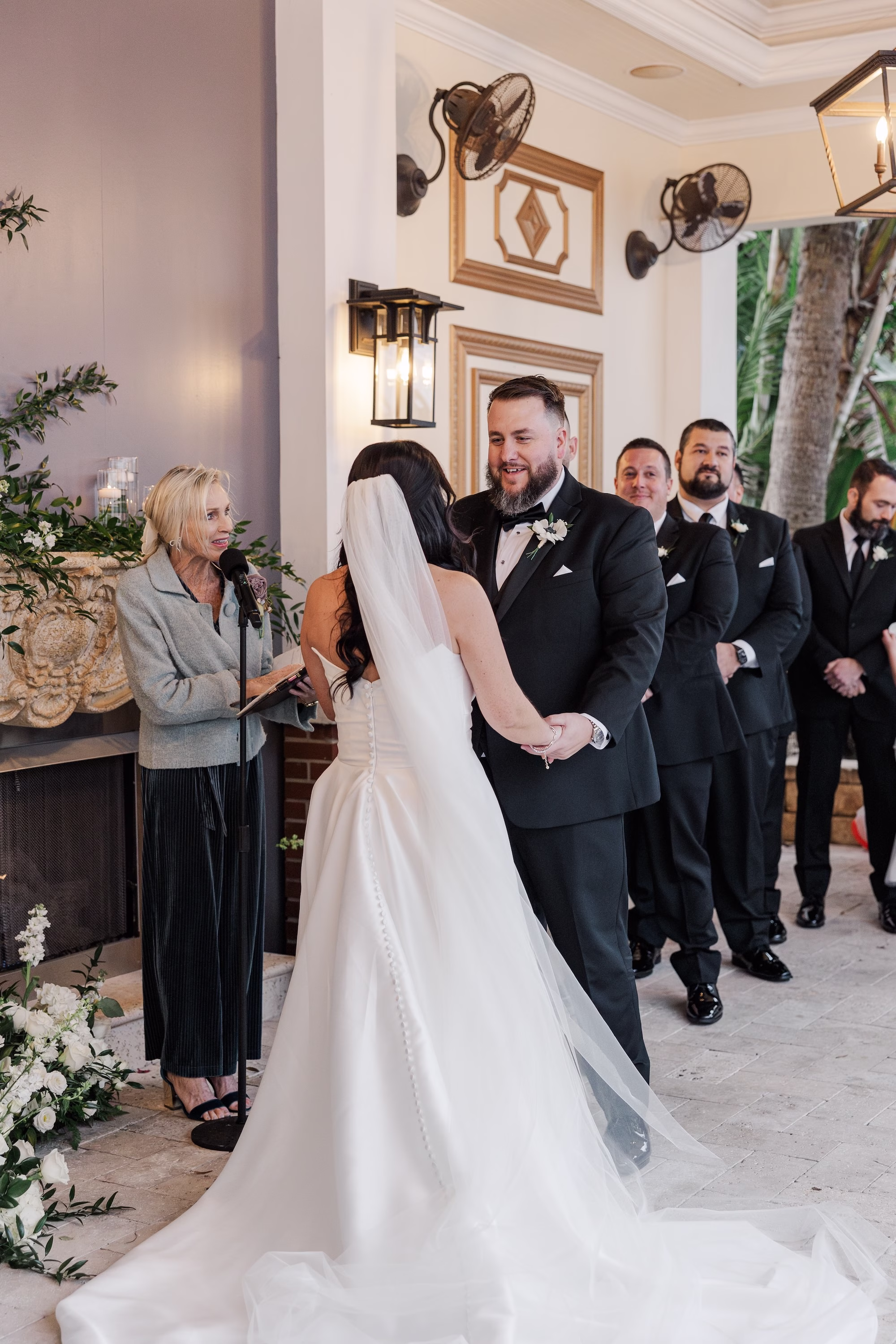 Bride and Groom Holding Hands Wedding Ceremony Portrait with Officiant | Palmetto Officiant Laurie Chandler Celebrant