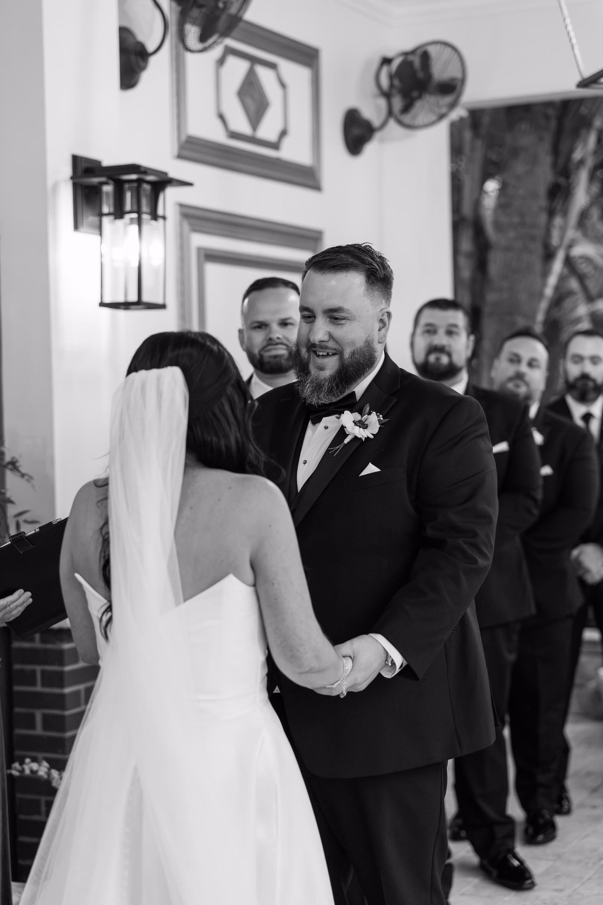 Black and White Bride and Groom Wedding Ceremony Portrait with Groomsmen