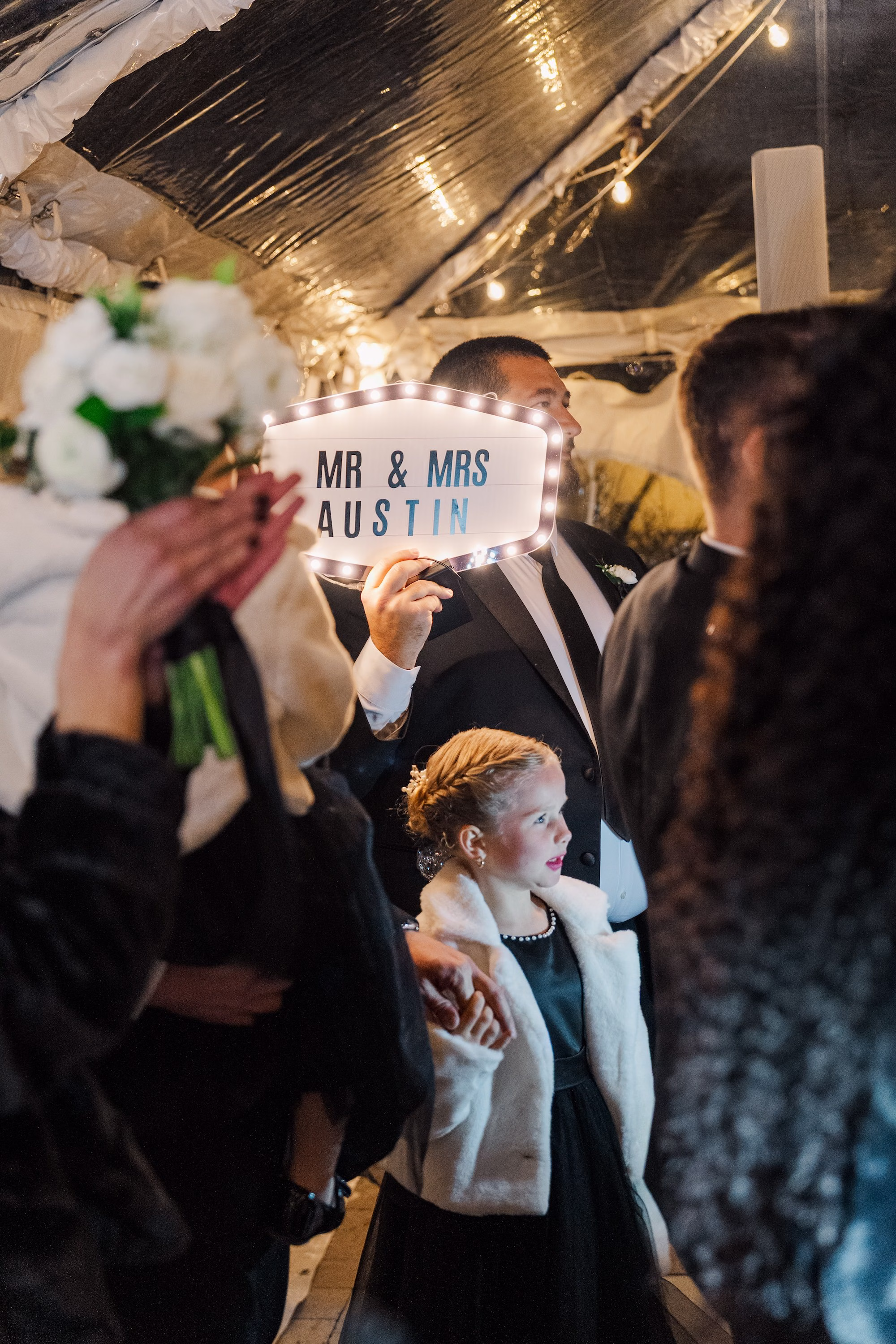 Guests Holding Light Up Mr and Mrs Austin Signs Wedding Reception Dance Floor Portrait | Palmetto DJ Graingertainment
