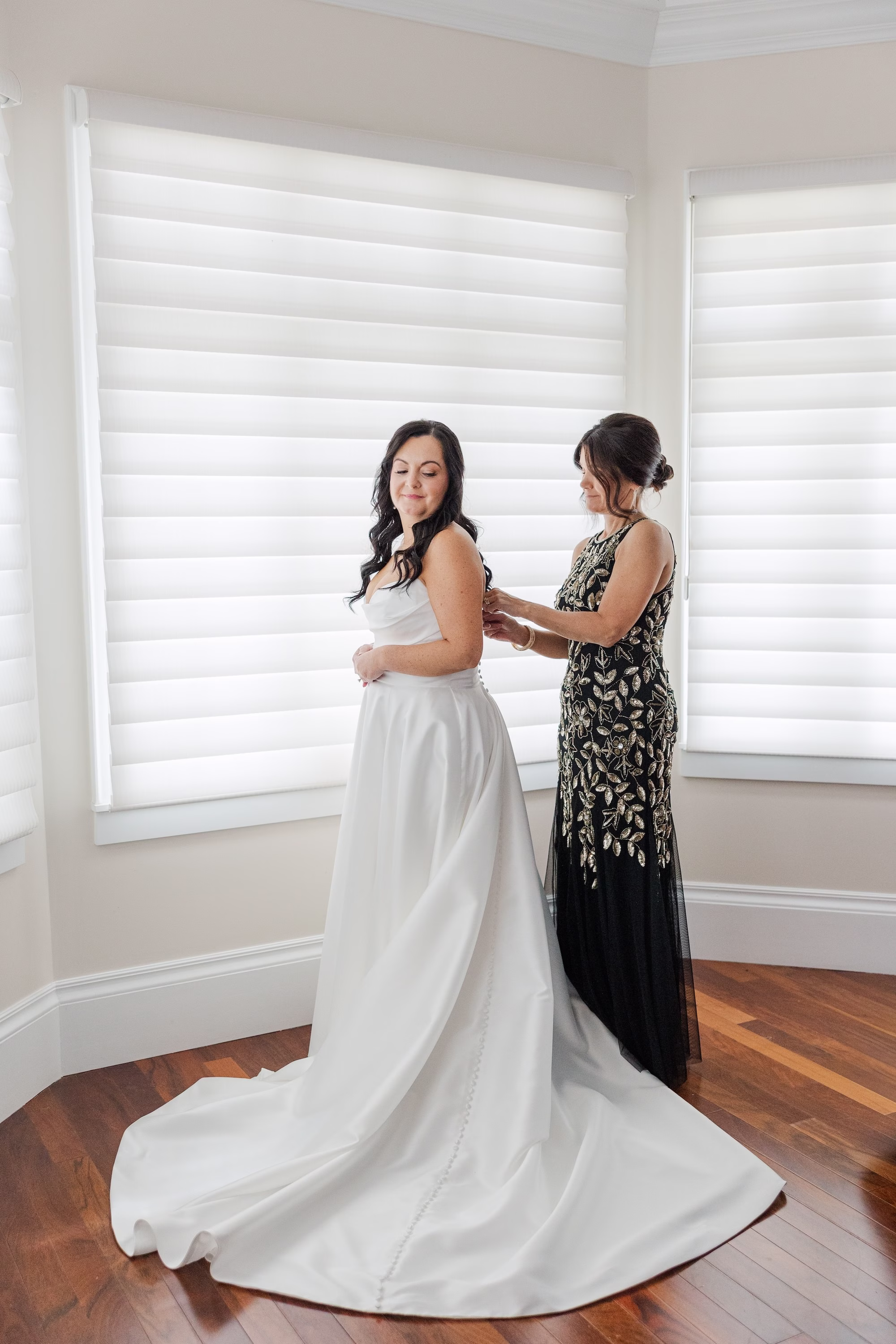 Mother of the Bride Helping Bride into Ivory Satin Strapless Jenny Yoo Wedding Dress Getting Ready Portrait