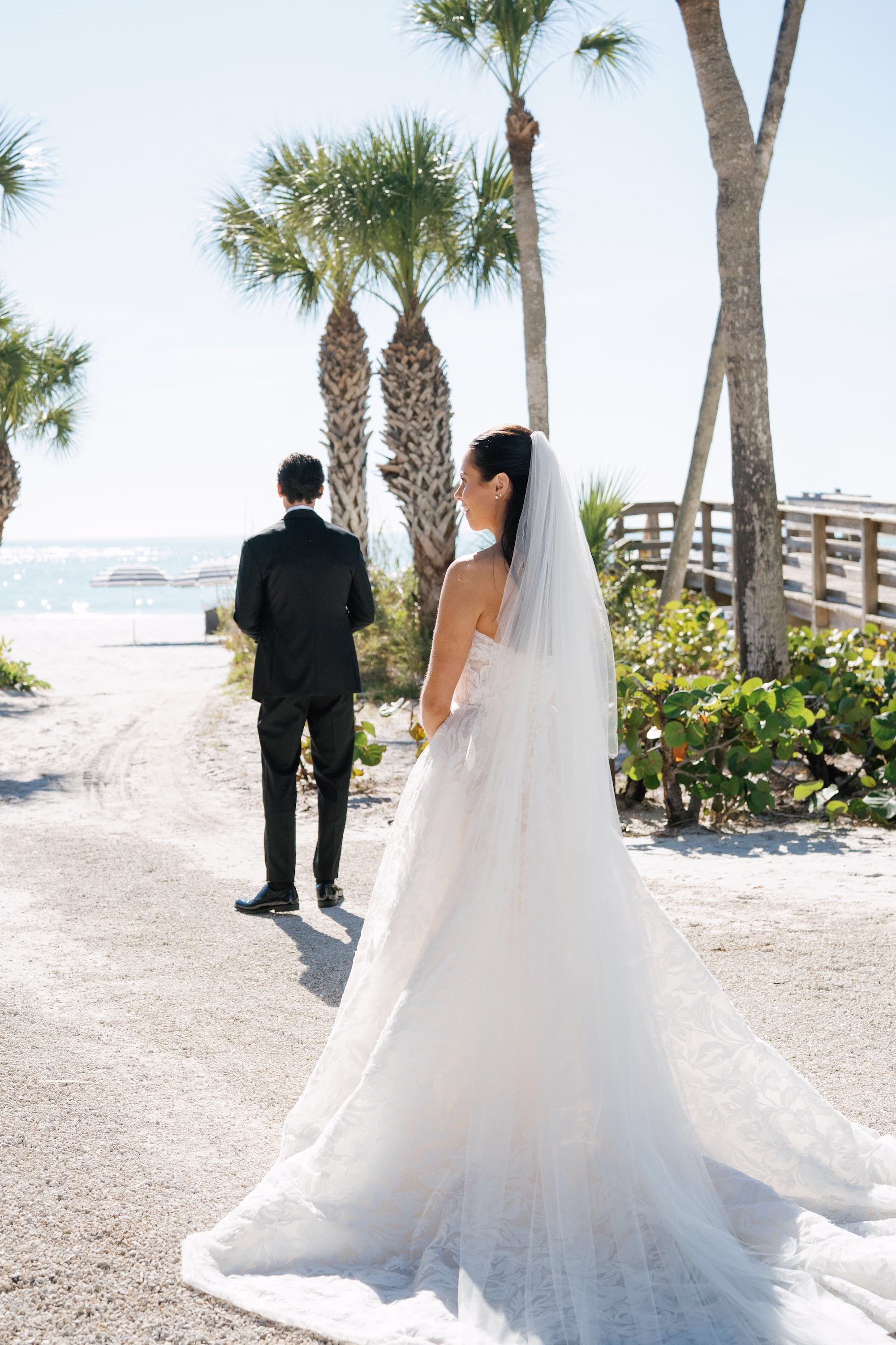 7Coastal Nancy Meyers Inspired Florida Beach Wedding - Coastal Blue, White, and Green Sarasota Wedding | The Resort at Longboat Key Club Bride and Groom First Look Wedding Portrait