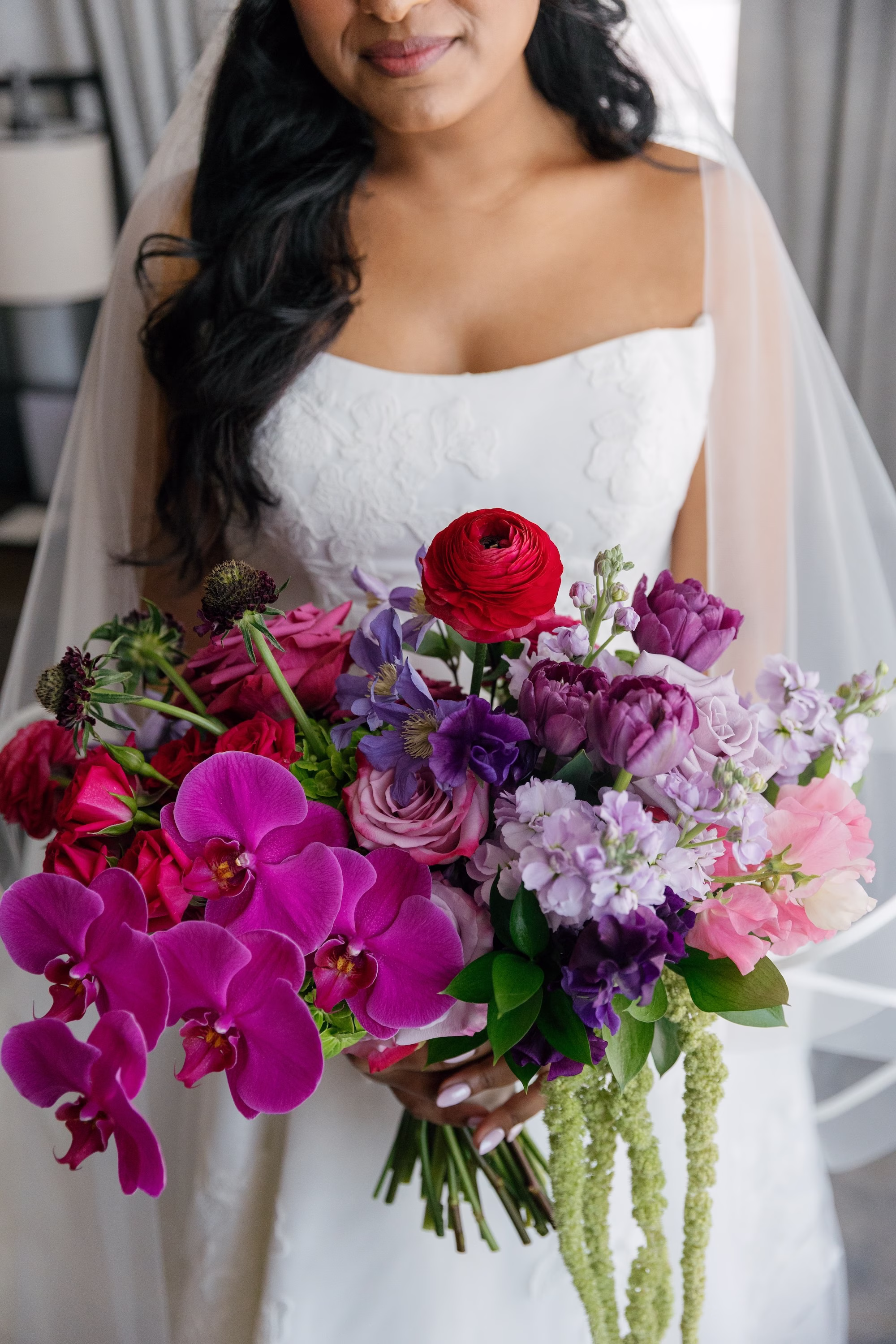 Vibrant Fuchsia Orchid, Red Ranunculus, Purple Rose and Lavender Stock Bridal Bouquet with Hanging Amaranthus Ideas | St. Pete Florist Bruce Wayne Florals